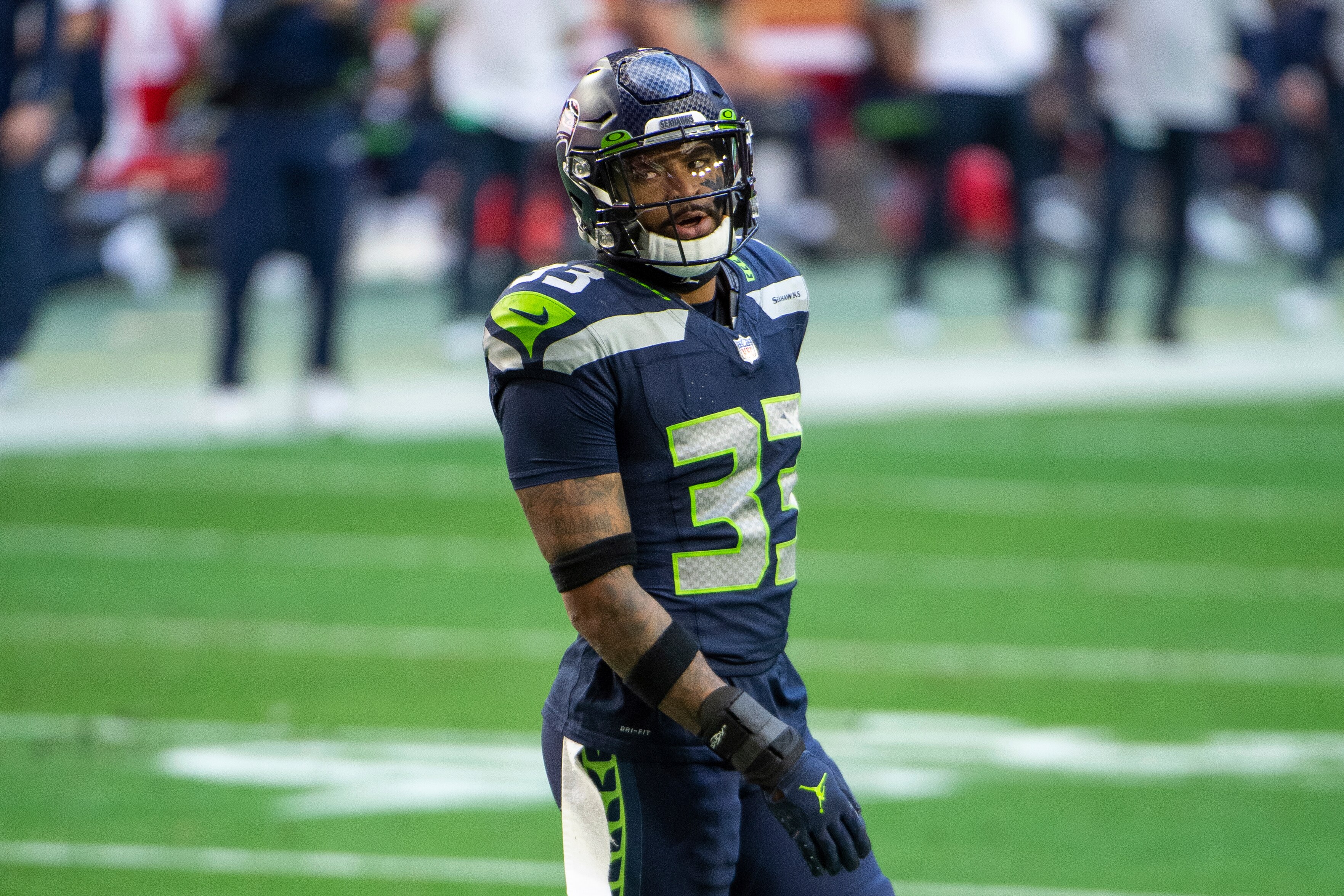 Seattle Seahawks strong safety Jamal Adams (33) reacts on the field against the San Francisco 49ers during an NFL football game, Sunday, Jan. 3, 2021, in Glendale, Ariz. (AP Photo/Jennifer Stewart)