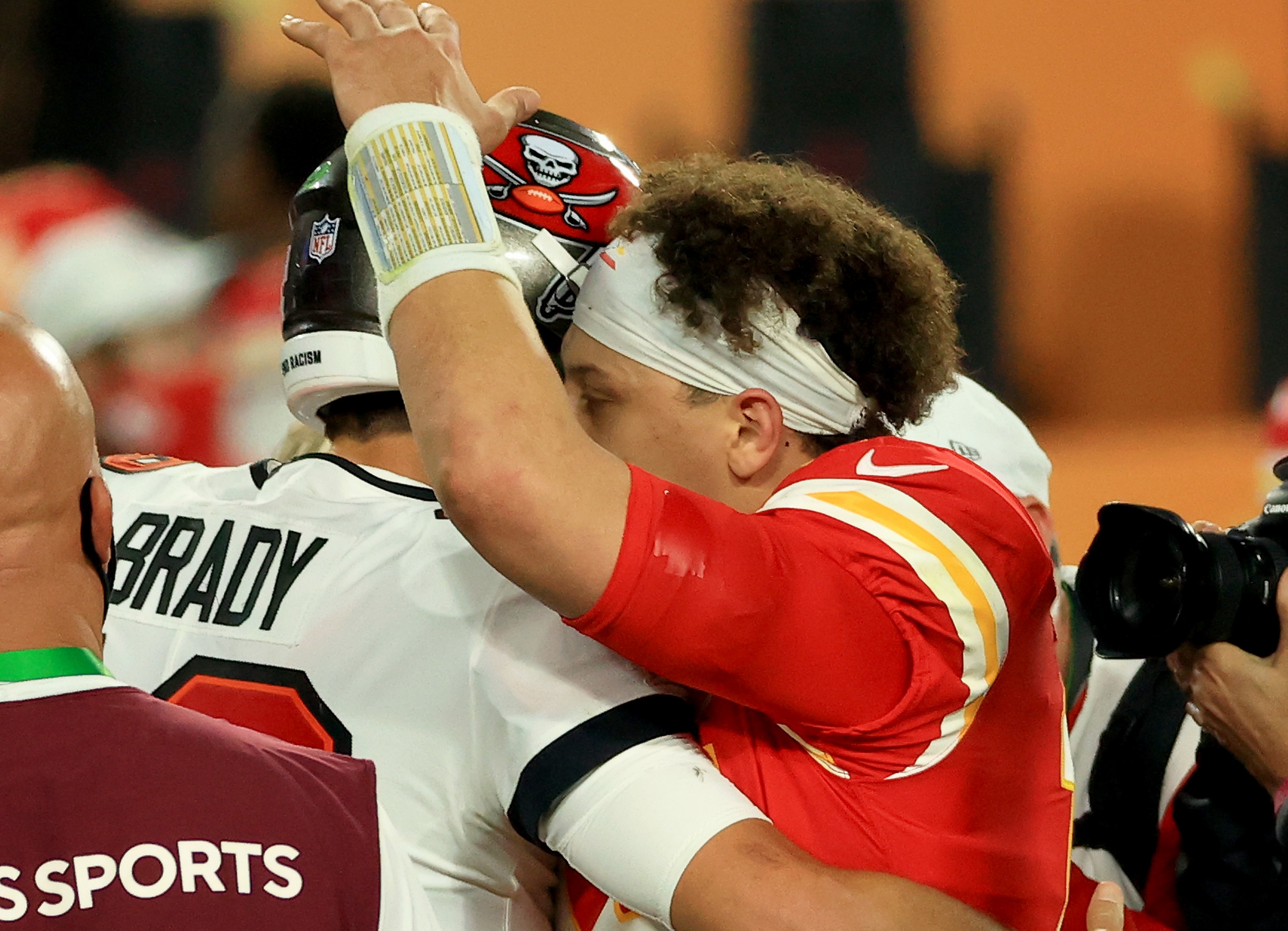 TAMPA, FLORIDA - FEBRUARY 07: Tom Brady #12 of the Tampa Bay Buccaneers and Patrick Mahomes #15 of the Kansas City Chiefs speak after Super Bowl LV at Raymond James Stadium on February 07, 2021 in Tampa, Florida. The Buccaneers defeated the Chiefs 31-9.
 (Photo by Mike Ehrmann/Getty Images)