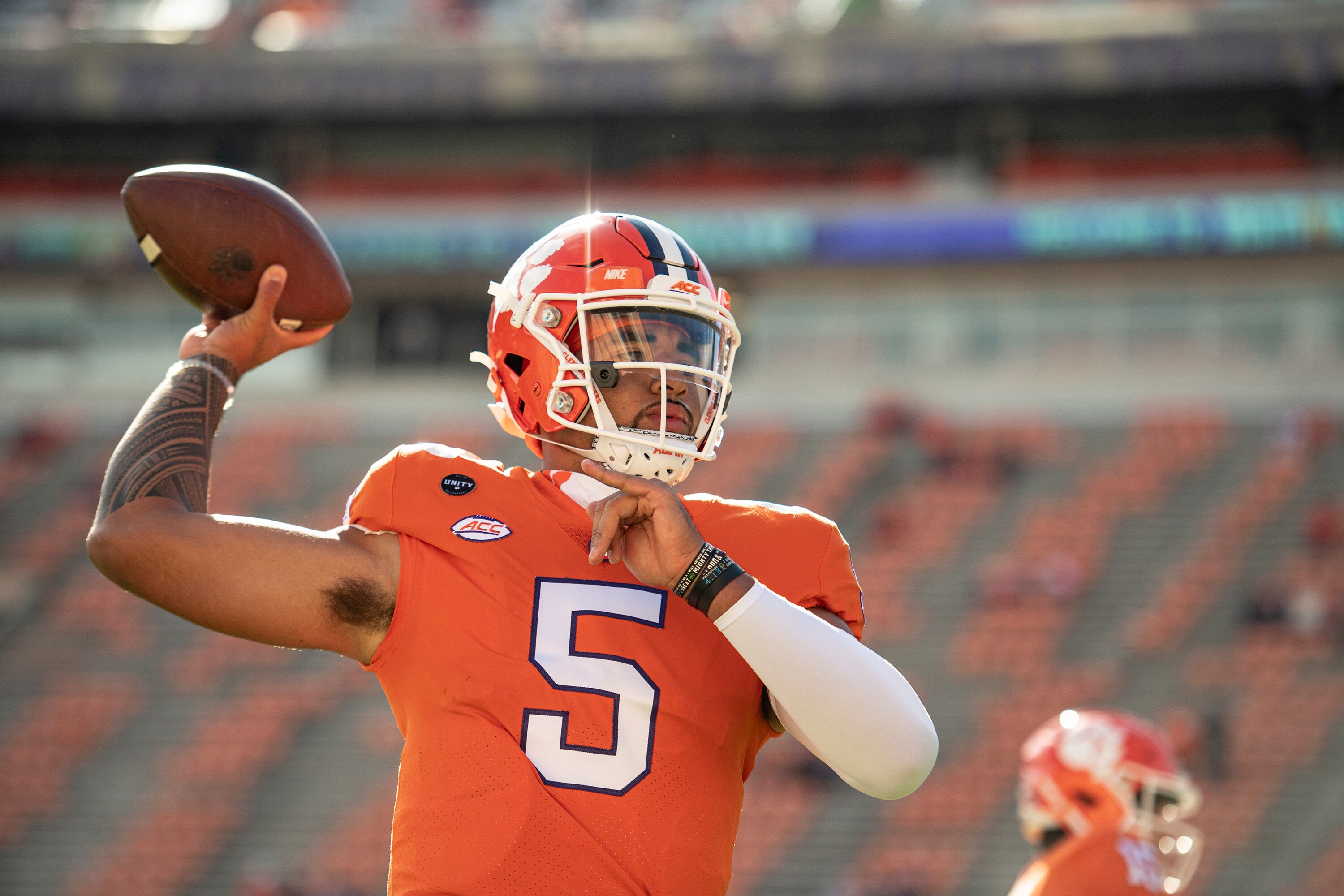 Clemson quarterback D.J. Uiagalelei (5) warms up before an NCAA college football game against Boston College on Saturday, Oct. 31, 2020, in Clemson, S.C.  (Josh Morgan/Pool Photo via AP)