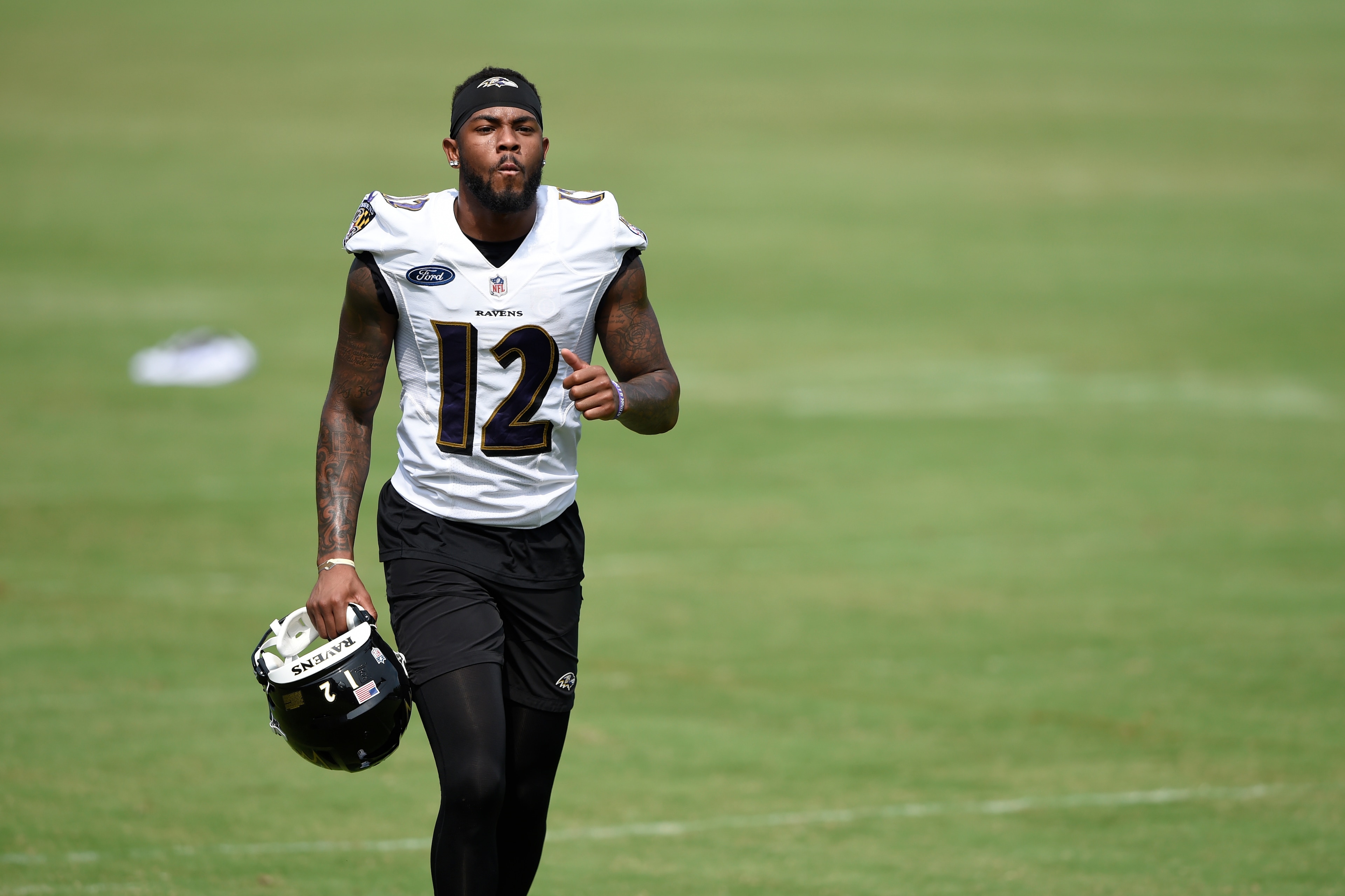 Baltimore Ravens Rashod Bateman runs off the field after an NFL football practice, Monday, Aug. 9, 2021 in Owings Mills, Md.(AP Photo/Gail Burton) Baltimore Ravens Rashod Bateman runs off the field after an NFL football practice, Monday, Aug. 9, 2021 in Owings Mills, Md.(AP Photo/Gail Burton)