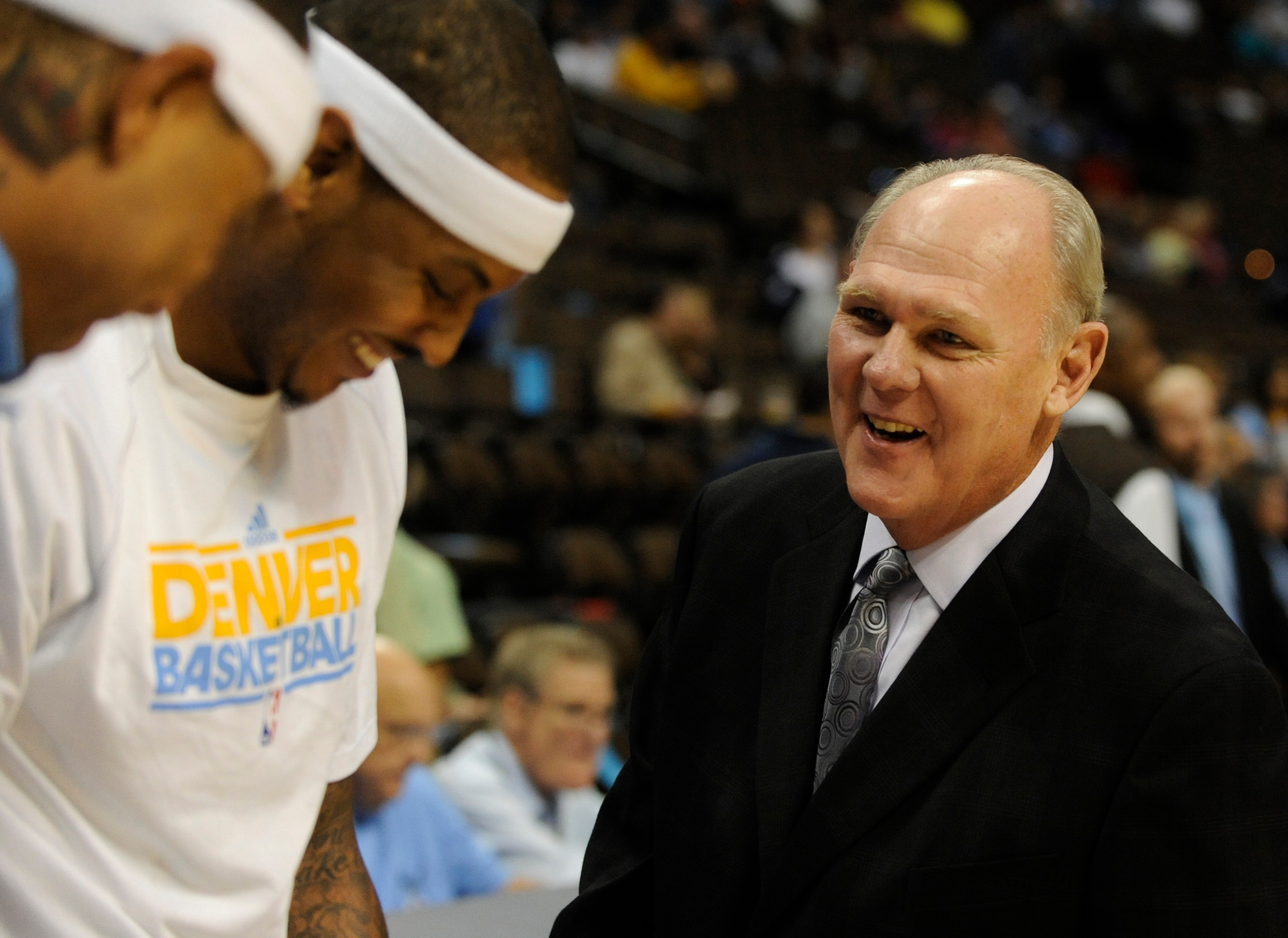 Denver coach George Karl joked with Kenyon Martin and Carmelo Anthony before the game Friday night. The Denver Nuggets hosted the Portland Trail Blazers Friday night, October 8, 2010 at the Pepsi Center. Karl Gehring/The Denver Post  (Photo By Karl Gehring/The Denver Post via Getty Images)