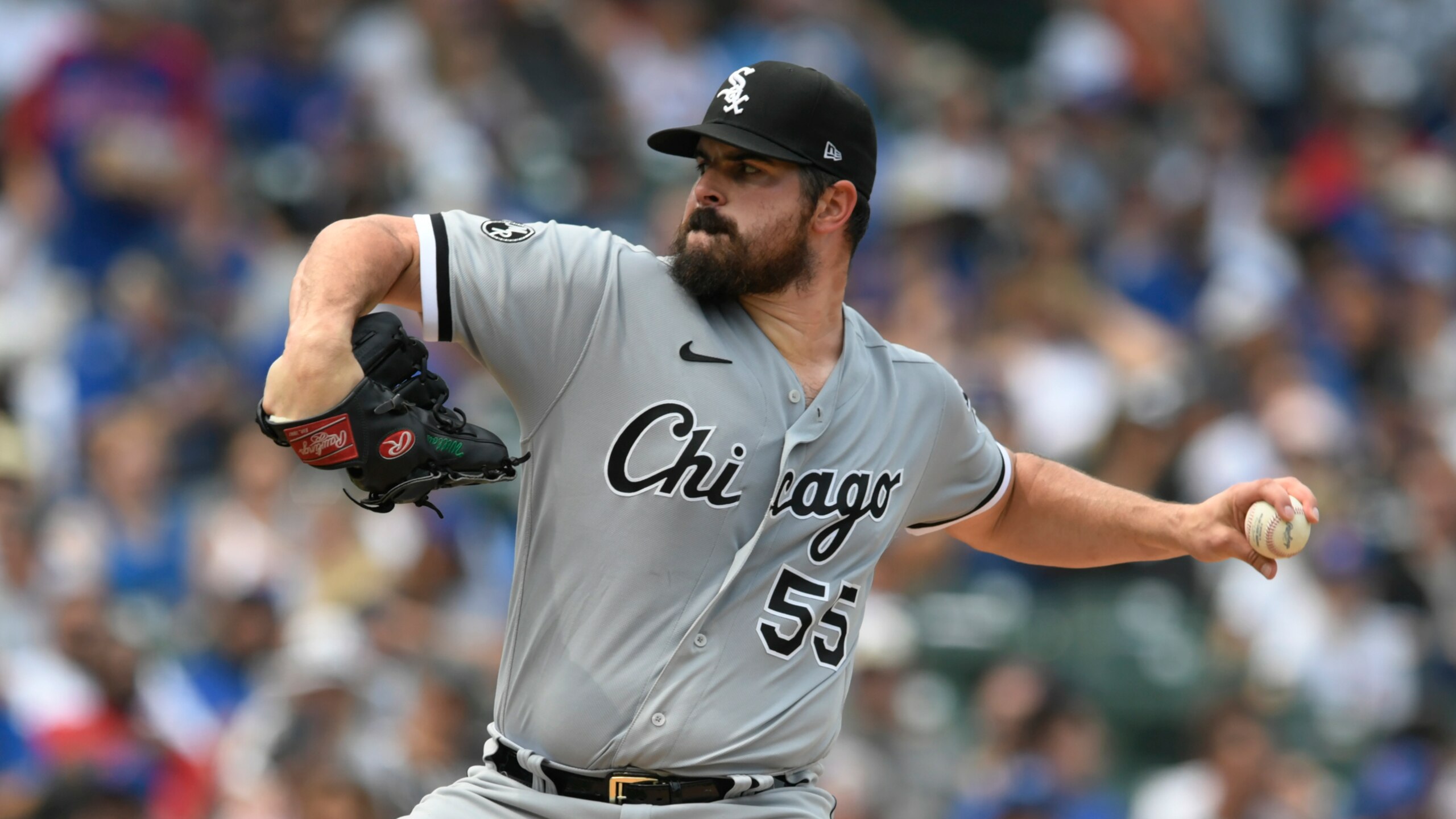 Chicago White Sox opener Carlos Rodon delivers a pitch during the first inning of a baseball game against the Chicago Cubs Saturday, Aug 7, 2021, at Wrigley Field in Chicago. The White Sox won 4-0. (AP Photo/Paul Beaty)