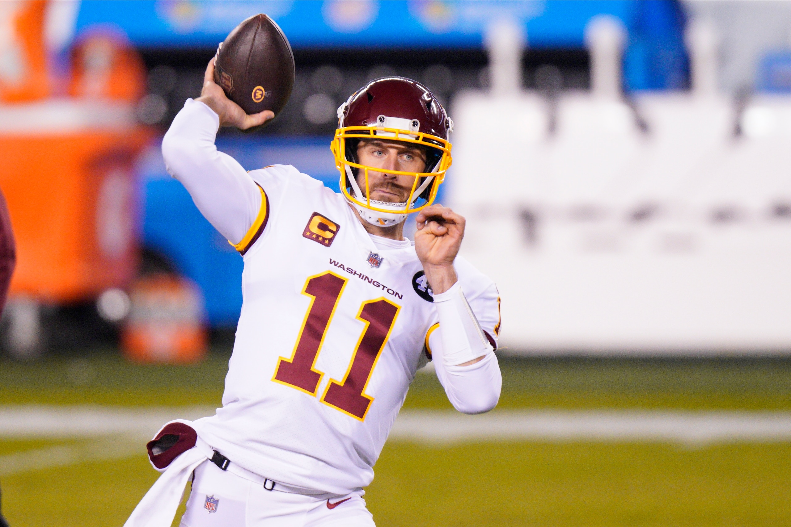 FILE - Washington Football Team quarterback Alex Smith warms up before an NFL football game against the Philadelphia Eagles in Philadelphia, in this Sunday, Jan. 3, 2021, file photo. Washington’s biggest offseason need is to figure out its quarterback situation. Trade for DeShaun Watson? Sign Cam Newton? Roll with Alex Smith and Kyle Allen? Coach Ron Rivera says “nothing is off the table.” (AP Photo/Chris Szagola, File) FILE - Washington Football Team quarterback Alex Smith warms up before an NFL football game against the Philadelphia Eagles in Philadelphia, in this Sunday, Jan. 3, 2021, file photo. Washington’s biggest offseason need is to figure out its quarterback situation. Trade for DeShaun Watson? Sign Cam Newton? Roll with Alex Smith and Kyle Allen? Coach Ron Rivera says “nothing is off the table.” (AP Photo/Chris Szagola, File)