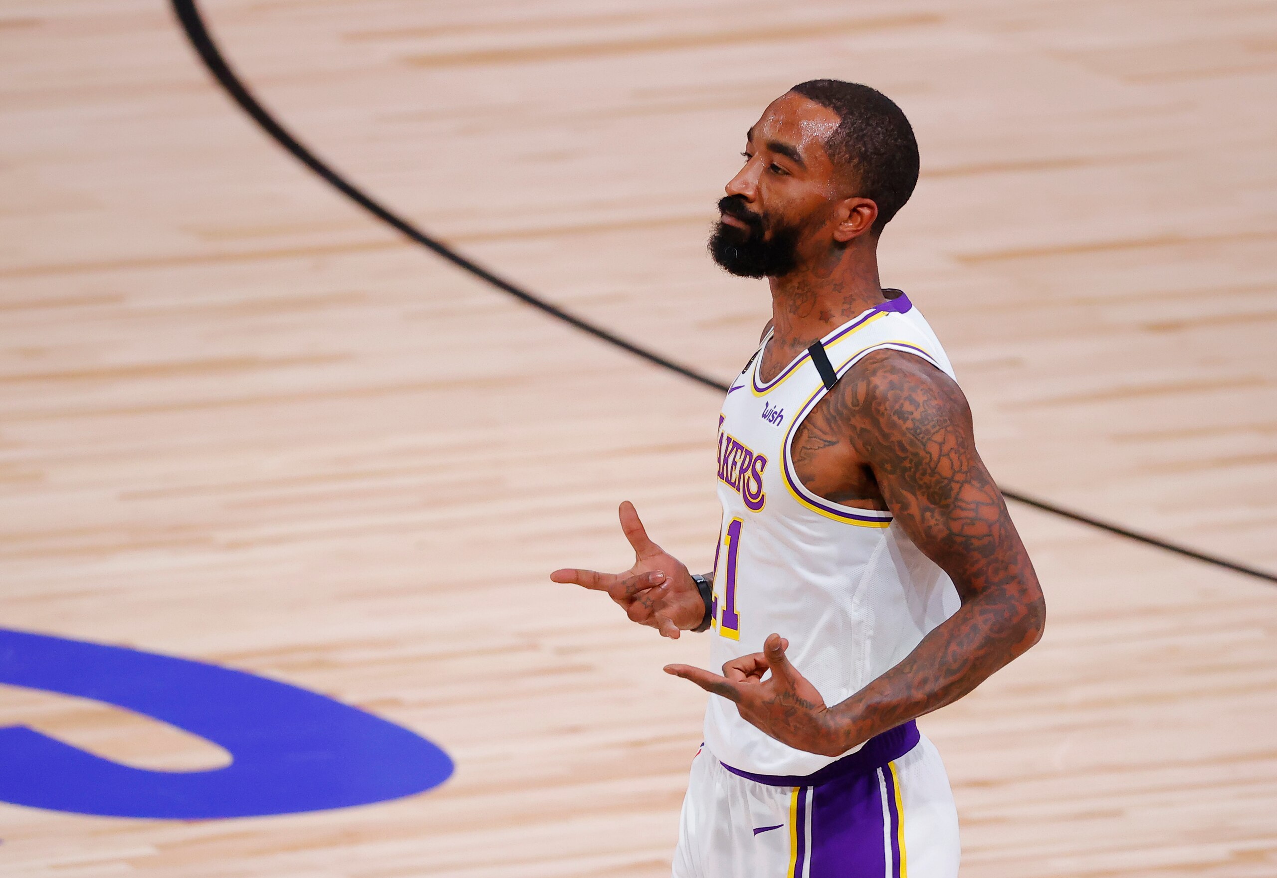 LAKE BUENA VISTA, FLORIDA - OCTOBER 04: JR Smith #21 of the Los Angeles Lakers reacts after a three point basket during the first half against the Miami Heat in Game Three of the 2020 NBA Finals at AdventHealth Arena at ESPN Wide World Of Sports Complex on October 04, 2020 in Lake Buena Vista, Florida. NOTE TO USER: User expressly acknowledges and agrees that, by downloading and or using this photograph, User is consenting to the terms and conditions of the Getty Images License Agreement. (Photo by Kevin C. Cox/Getty Images)