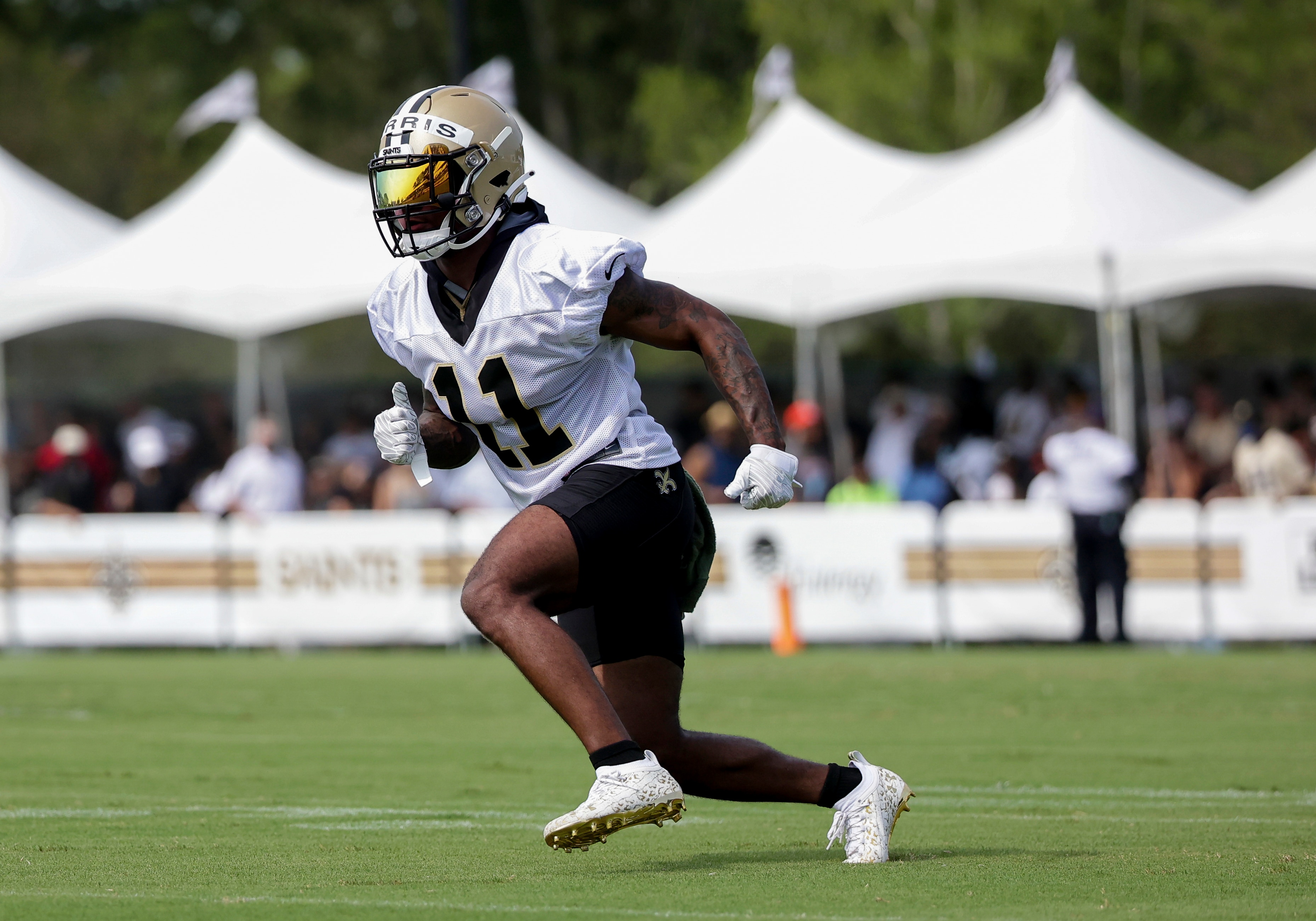 New Orleans Saints wide receiver Deonte Harris (11) runs a route during NFL football training camp in Metairie, Saturday, July 31, 2021. (AP Photo/Derick Hingle)