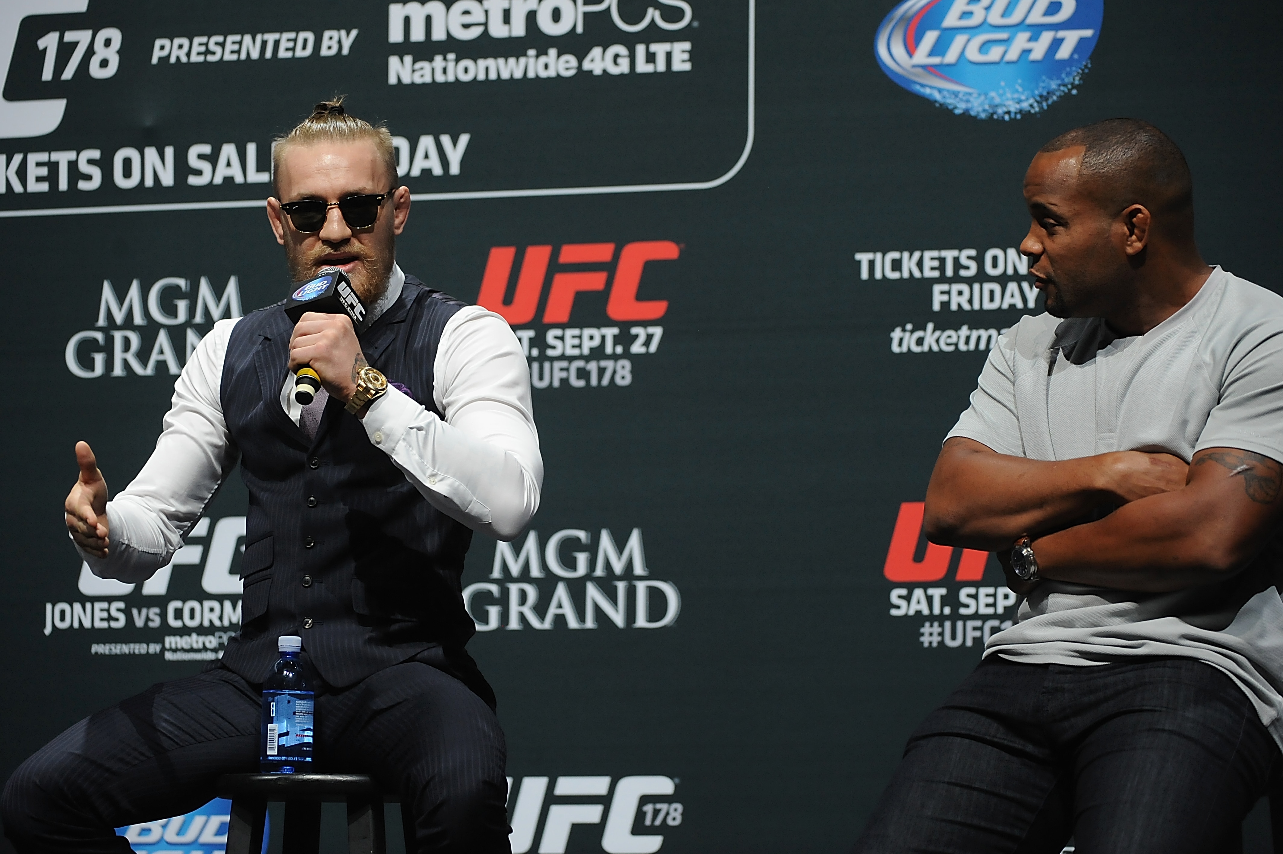 LOS ANGELES, CA - AUGUST 05: (L-R)  Mixed martial artist Conor McGregor of Ireland and Daniel Cormier talk during a UFC Q&A at LA Live on August 5, 2014 in Los Angeles, California.  (Photo by Jonathan Moore/Zuffa LLC/Zuffa LLC via Getty Images)