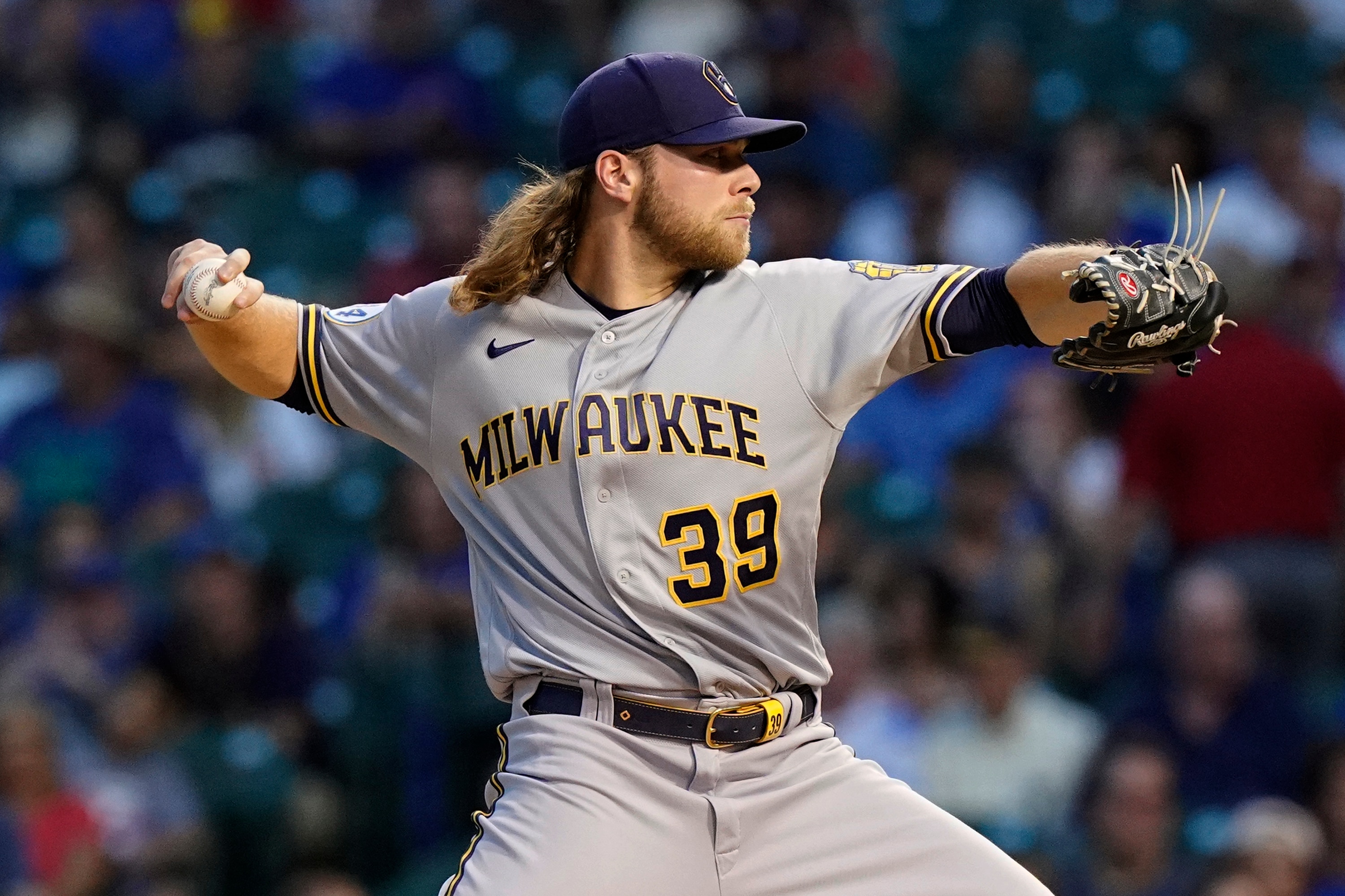 Milwaukee Brewers starting pitcher Corbin Burnes throws to a Chicago Cubs batter during the first inning of a baseball game in Chicago, Wednesday, Aug. 11, 2021. (AP Photo/Nam Y. Huh)