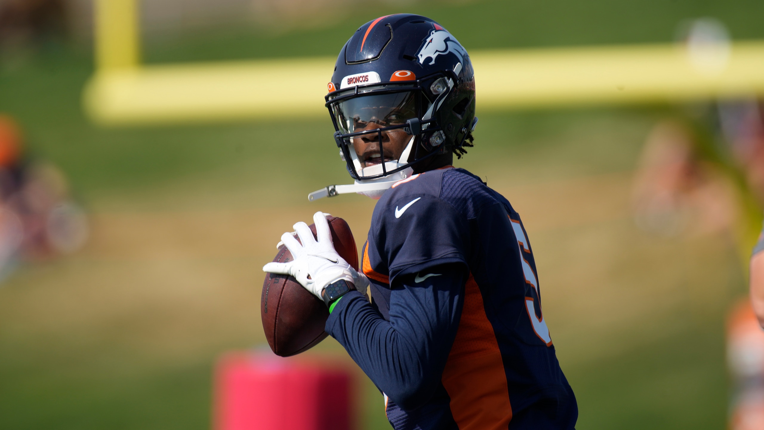 Denver Broncos quarterback Teddy Bridgewater (5) takes part in drills during an NFL football training camp Friday, Aug. 6, 2021, at the team's headquarters in Englewood, Colo. (AP Photo/David Zalubowski)