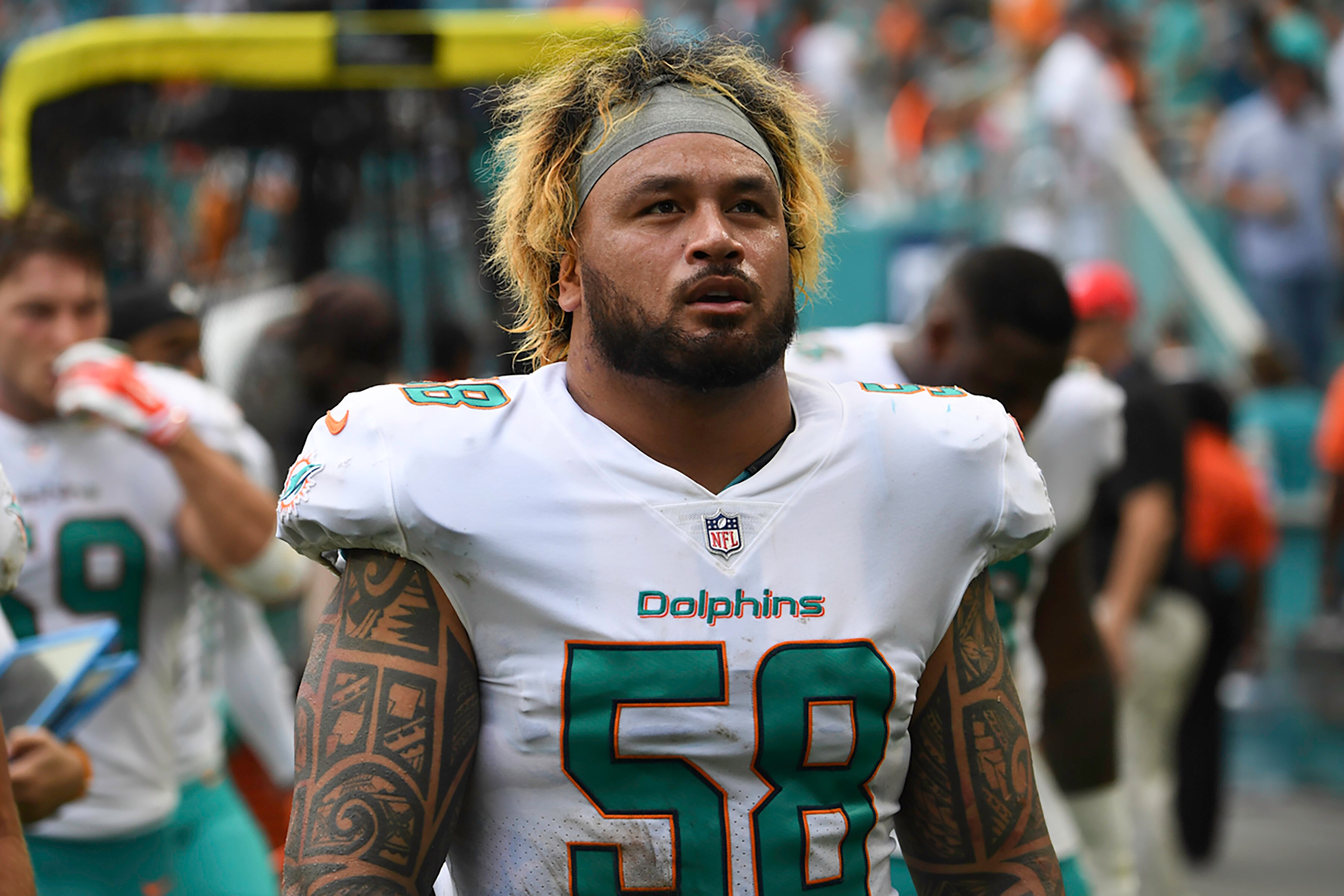 MIAMI GARDENS, FL - OCTOBER 08:  Rey Maualuga #58 of the Miami Dolphins looks on during a NFL game against the Tennessee Titans on October 8, 2017 at Hard Rock Stadium in Miami Gardens, Florida.  (Photo by Ron Elkman/Sports Imagery/Getty Images) 