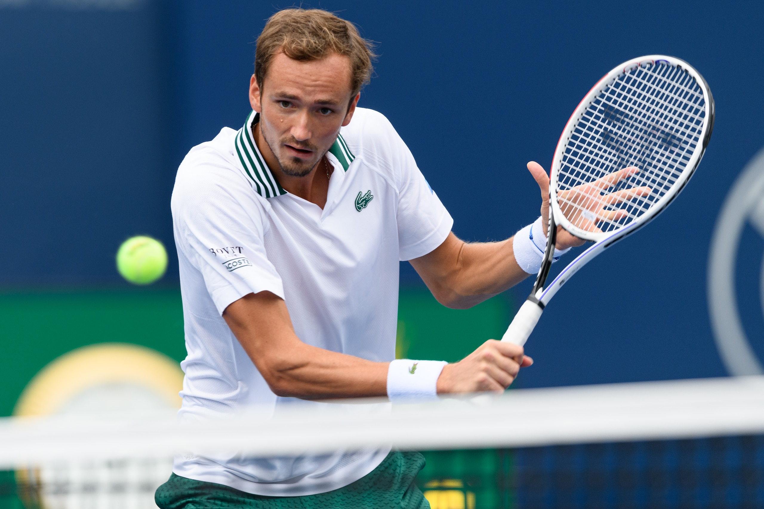 TORONTO, ON - AUGUST 10: Daniil Medvedev (RUS) returns the ball during his National Bank Open tennis tournament first round game on August 10, 2021, at Aviva Centre in Toronto, ON, Canada. (Photo by Julian Avram/Icon Sportswire via Getty Images) TORONTO, ON - AUGUST 10: Daniil Medvedev (RUS) returns the ball during his National Bank Open tennis tournament first round game on August 10, 2021, at Aviva Centre in Toronto, ON, Canada. (Photo by Julian Avram/Icon Sportswire via Getty Images)