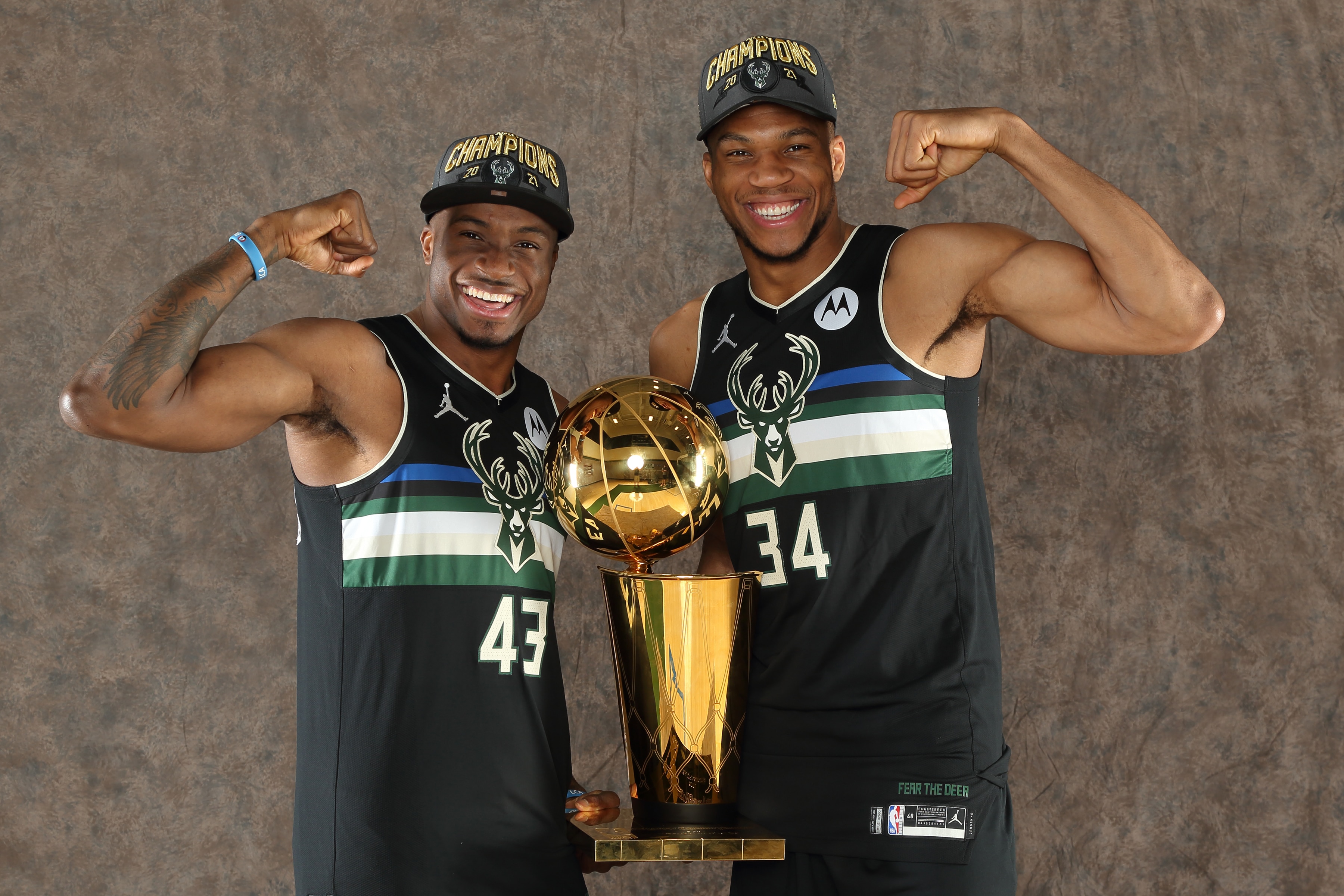 MILWAUKEE, WI - JULY 30: Thanasis Antetokounmpo #43 and Giannis Antetokounmpo #34 of the Milwaukee Bucks pose with the Larry O'Brien NBA Championship Trophy at the Froedtert & the Medical College of Wisconsin Sports Science Center on July 30, 2021  in Milwaukee, Wisconsin. NOTE TO USER: User expressly acknowledges and agrees that, by downloading and or using this Photograph, user is consenting to the terms and conditions of the Getty Images License Agreement. Mandatory Copyright Notice:  Copyright 2021 NBAE (Photo by Gary Dineen/NBAE via Getty Images)