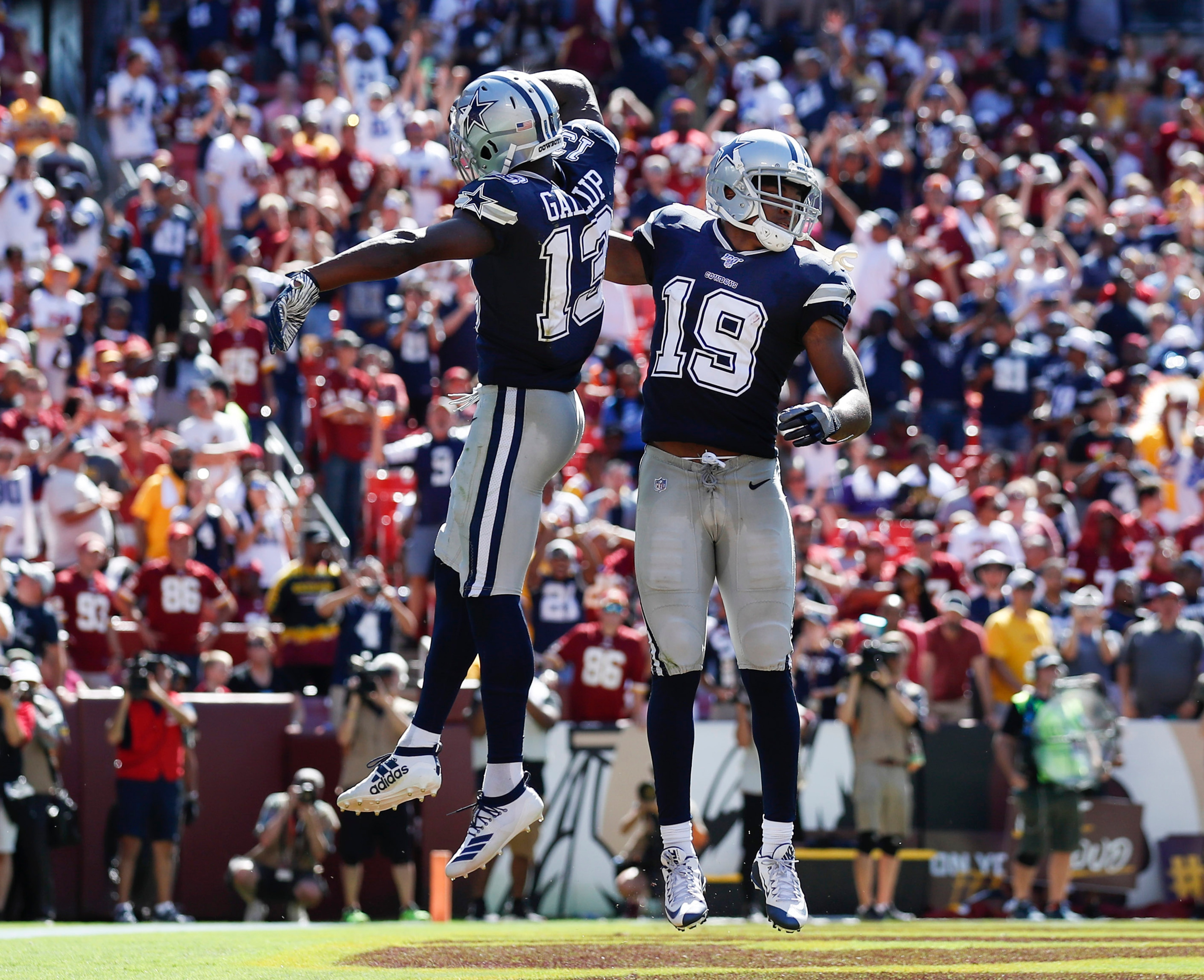 Dallas Cowboys wide receiver Amari Cooper (19) celebrates his touchdown with teammate wide receiver Michael Gallup (13) in the second half of an NFL football game, Sunday, Sept. 15, 2019, in Landover, Md. (AP Photo/Alex Brandon) Dallas Cowboys wide receiver Amari Cooper (19) celebrates his touchdown with teammate wide receiver Michael Gallup (13) in the second half of an NFL football game, Sunday, Sept. 15, 2019, in Landover, Md. (AP Photo/Alex Brandon)