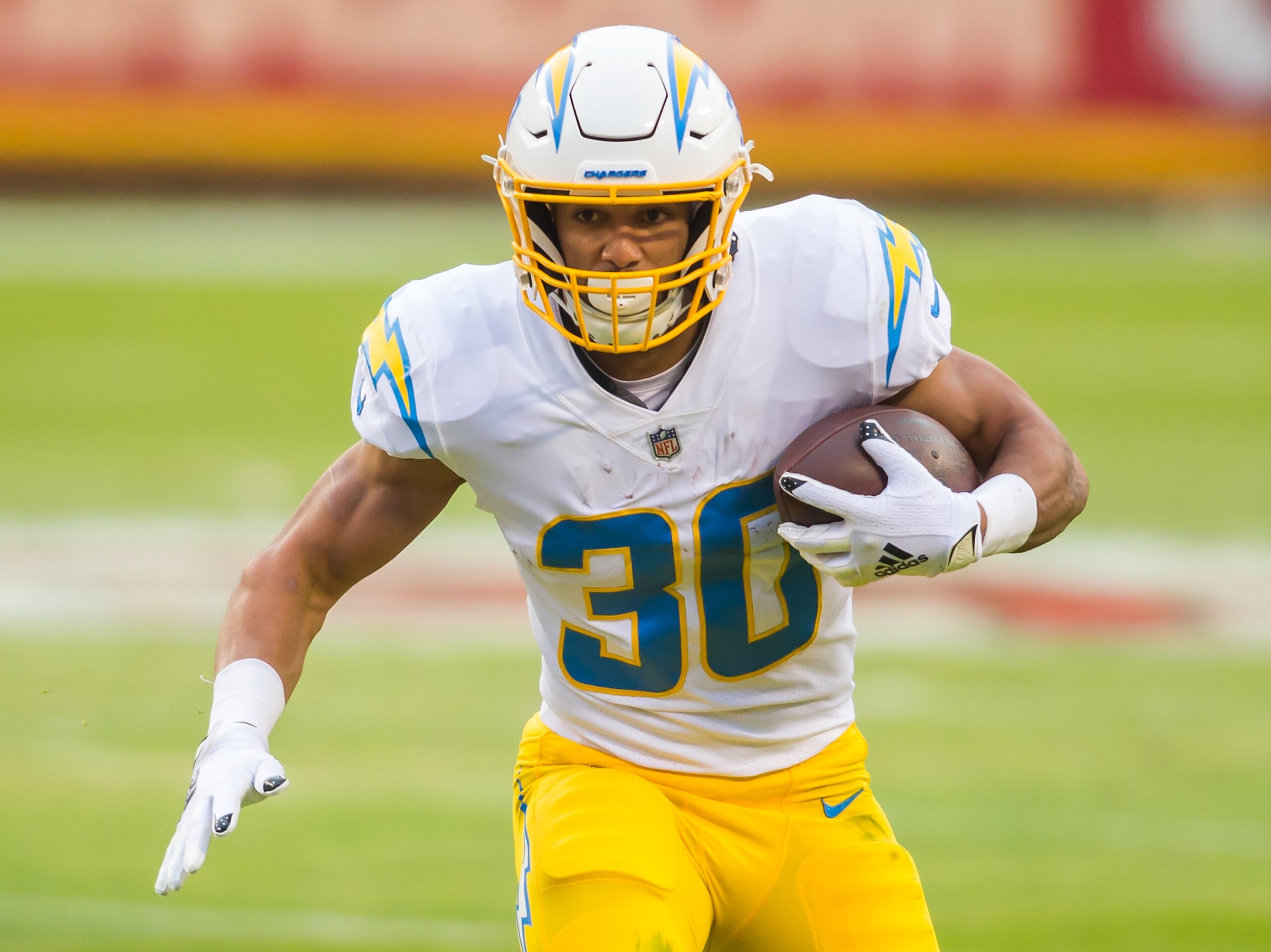 KANSAS CITY, MO - JANUARY 03: Los Angeles Chargers running back Austin Ekeler (30) brings the ball upfield  during the game between the Kansas City Chiefs and the Los Angeles Chargers on Sunday January 3, 2021 at Arrowhead Stadium in Kansas City, Missouri.  (Photo by Nick Tre. Smith/Icon Sportswire via Getty Images)