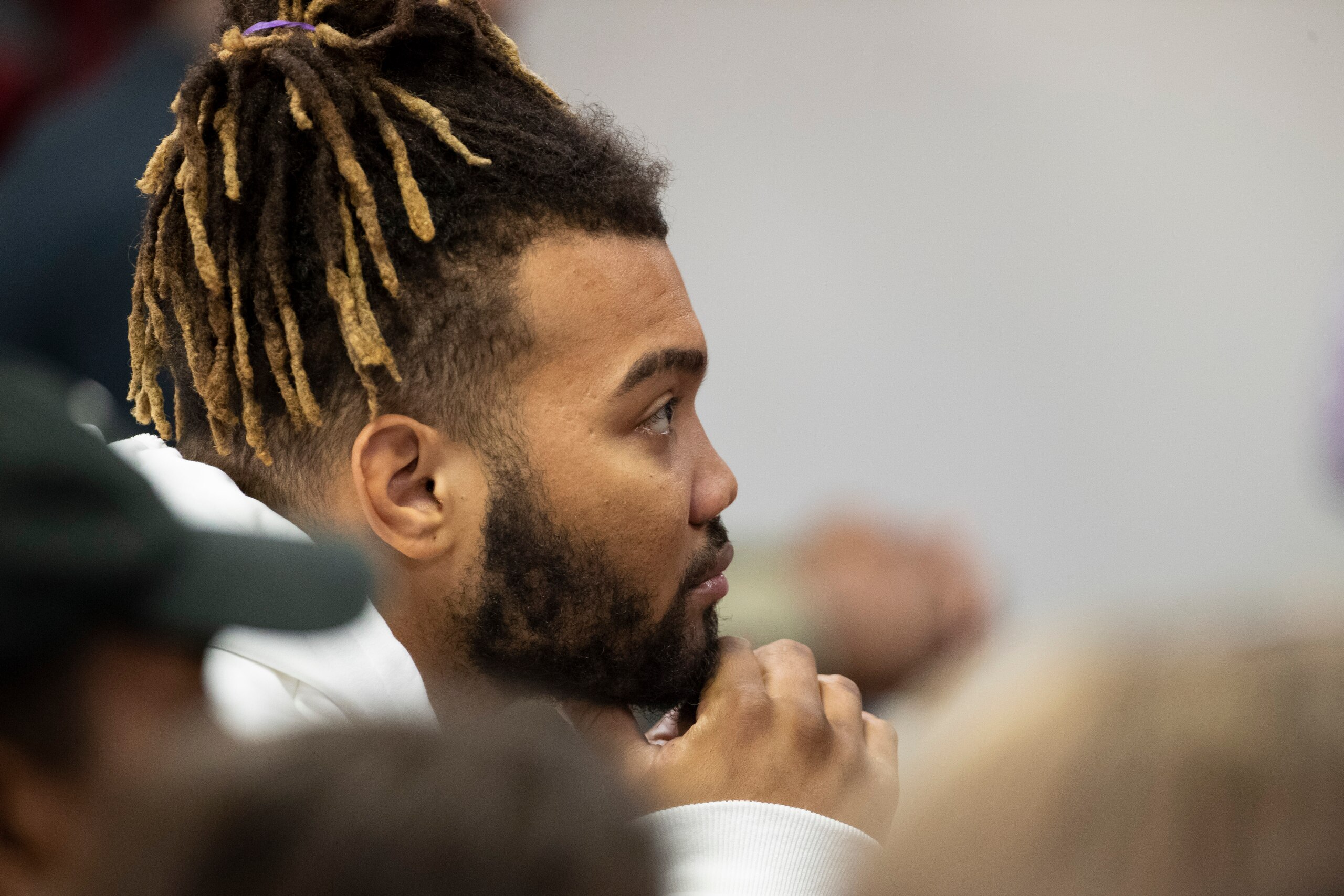 Washington Redskins running back Derrius Guice listens to new head coach Ron Rivera during a news conference at the team's NFL football training facility, Thursday, Jan. 2, 2020 in Ashburn, Va. (AP Photo/Alex Brandon)