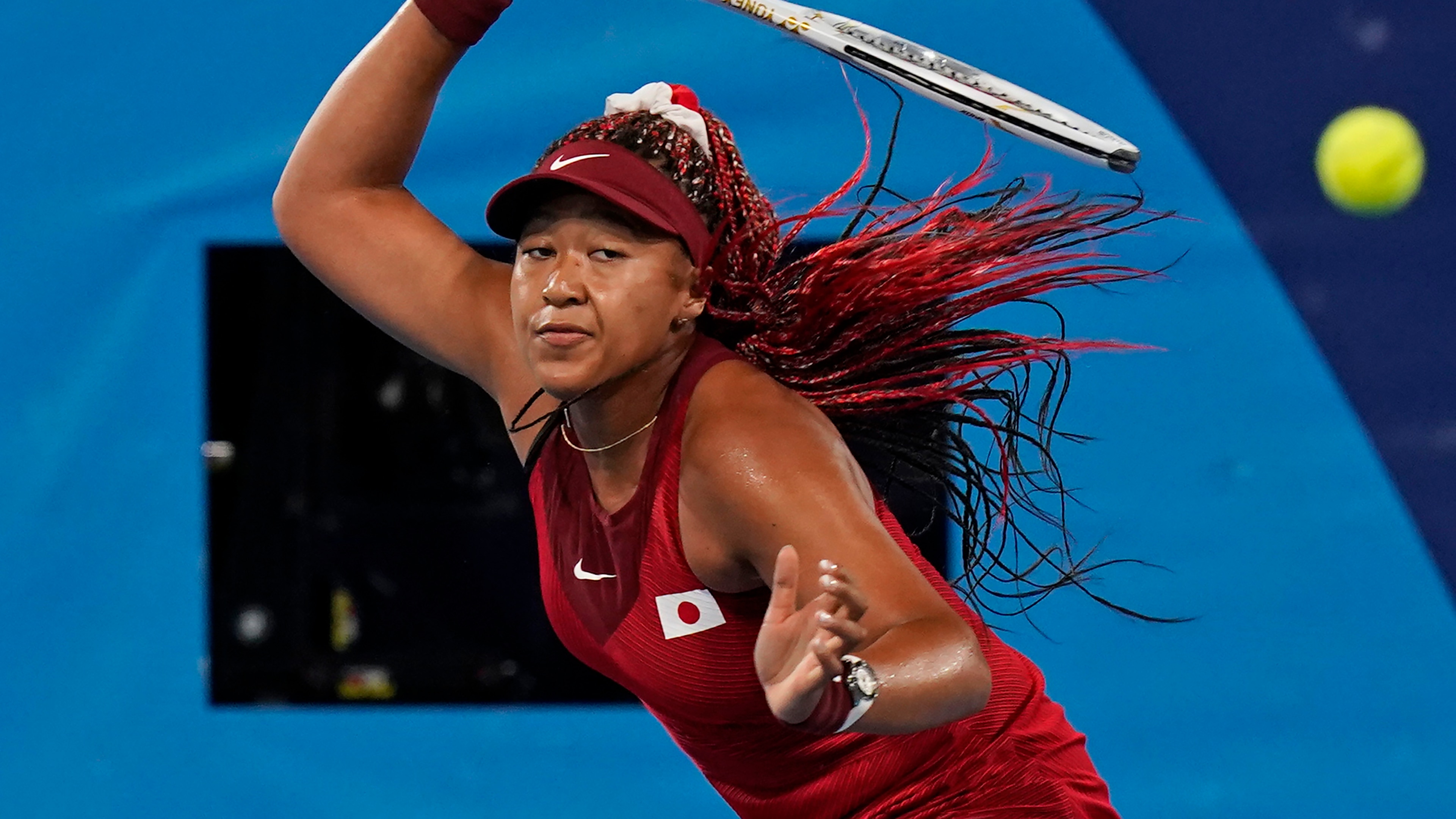 Naomi Osaka, of Japan, plays Marketa Vondrousova, of the Czech Republic, during the third round of the tennis competition at the 2020 Summer Olympics, Tuesday, July 27, 2021, in Tokyo, Japan. (AP Photo/Seth Wenig)