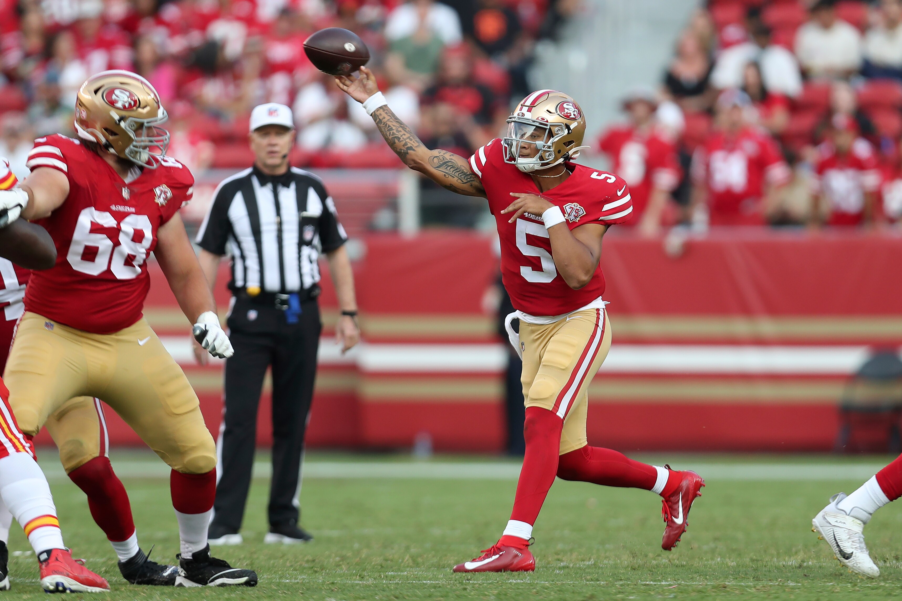 San Francisco 49ers quarterback Trey Lance (5) passes against the Kansas City Chiefs during the first half of an NFL preseason football game in Santa Clara, Calif., Saturday, Aug. 14, 2021. (AP Photo/Jed Jacobsohn)