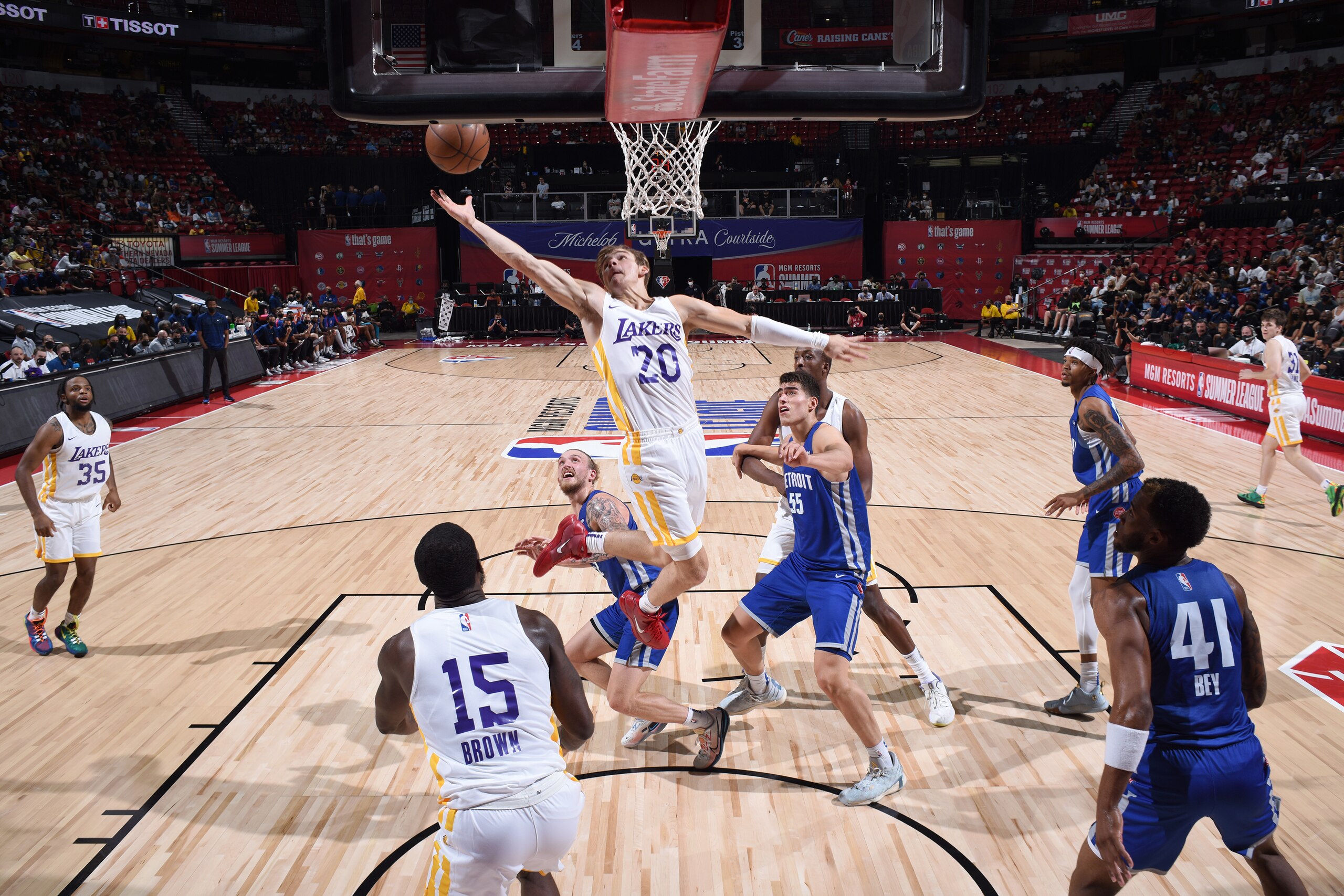 LAS VEGAS, NV - AUGUST 14:  Mac McClung #20 of the Los Angeles Lakers leaps for the ball during the game against the Detroit Pistons during the 2021 Las Vegas Summer League on August 14, 2021 at the Thomas & Mack Center in Las Vegas, Nevada. NOTE TO USER: User expressly acknowledges and agrees that, by downloading and or using this Photograph, User is consenting to the terms and conditions of the Getty Images License Agreement. Mandatory Copyright Notice: Copyright 2021 NBAE (Photo by Jeff Bottari/NBAE via Getty Images)