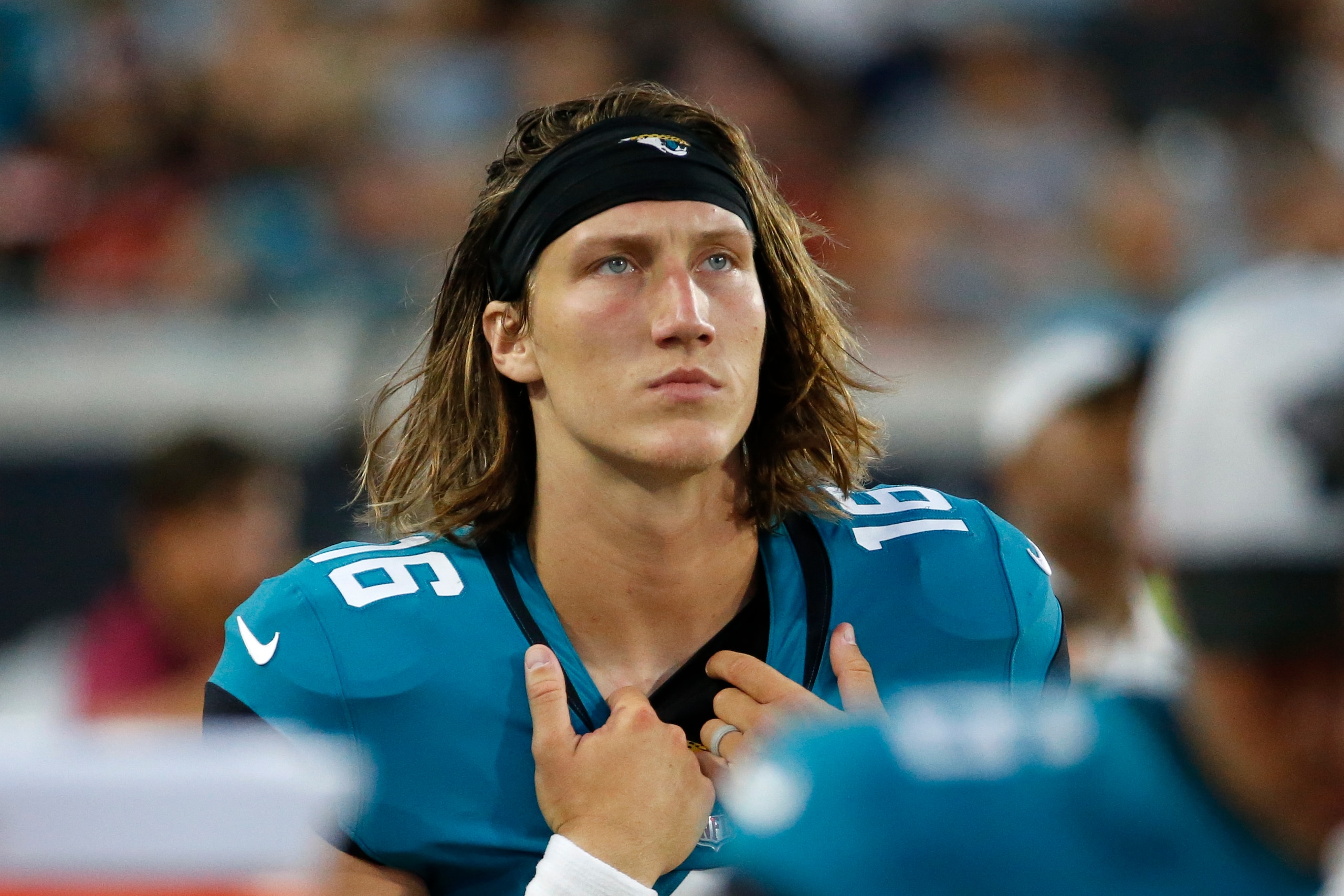 Jacksonville Jaguars quarterback Trevor Lawrence looks up at the scoreboard during the first half of an NFL preseason football game against the Cleveland Browns, Saturday, Aug. 14, 2021, in Jacksonville, Fla. (AP Photo/Stephen B. Morton)