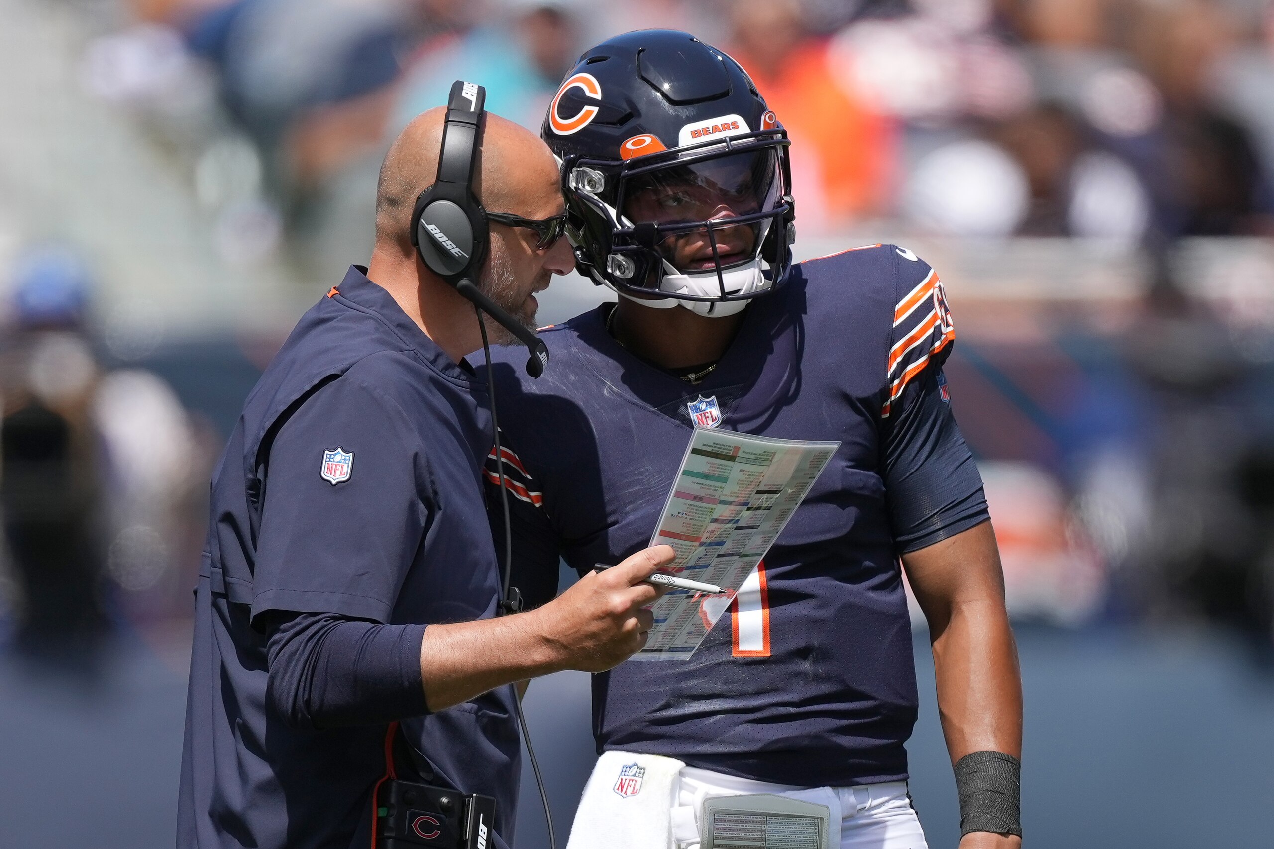 CHICAGO, IL - AUGUST 14: Chicago Bears quarterback Justin Fields (1) reviews plays with Chicago Bears head coach Matt Nagy during a preseason game between the Chicago Bears and the Miami Dolphins on August 14, 2021 at Soldier Field in Chicago, IL. (Photo by Robin Alam/Icon Sportswire via Getty Images)
