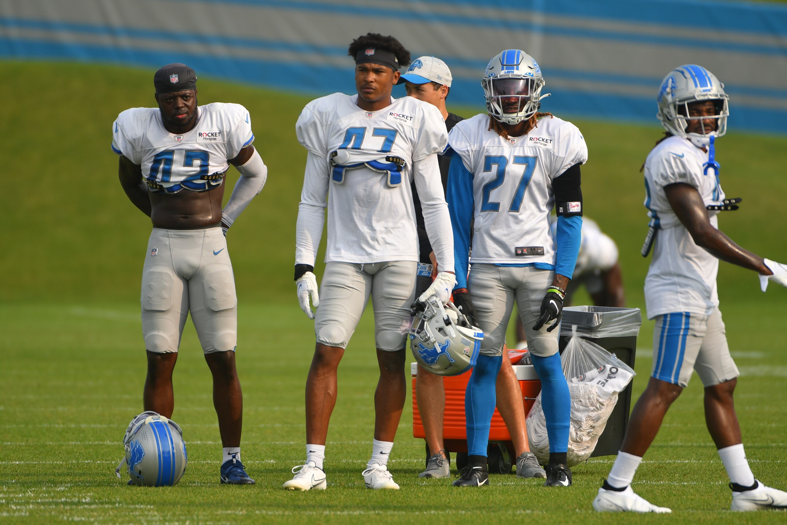 ALLEN PARK, MI - AUGUST 10: Detroit Lions Jalen Elliott safety (42), Detroit Lions Alex Brown cornerback (27), and Detroit Lions safety Booby Price (47) wait their turn to run drills during Detroit Lions Training Camp on August 10, 2021 at Lions Practice Facility in Allen Park, MI (Photo by Allan Dranberg/Icon Sportswire via Getty Images)
