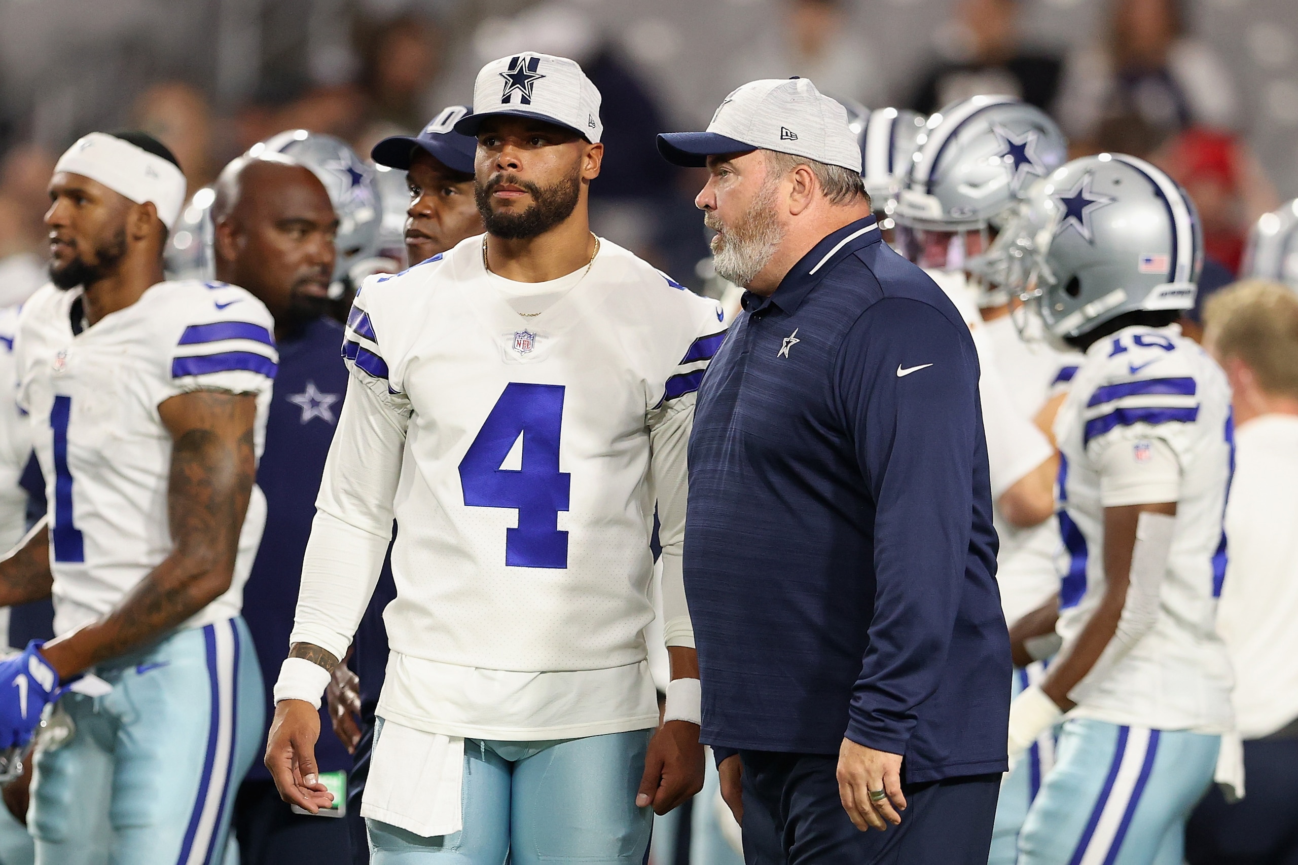 GLENDALE, ARIZONA - AUGUST 13: Quarterback Dak Prescott #4 and head coach Mike McCarthy of the Dallas Cowboys before the NFL preseason game against the Arizona Cardinals at State Farm Stadium on August 13, 2021 in Glendale, Arizona. The Cardinals defeated the Dallas Cowboys 19-16. (Photo by Christian Petersen/Getty Images) GLENDALE, ARIZONA - AUGUST 13: Quarterback Dak Prescott #4 and head coach Mike McCarthy of the Dallas Cowboys before the NFL preseason game against the Arizona Cardinals at State Farm Stadium on August 13, 2021 in Glendale, Arizona. The Cardinals defeated the Dallas Cowboys 19-16. (Photo by Christian Petersen/Getty Images)