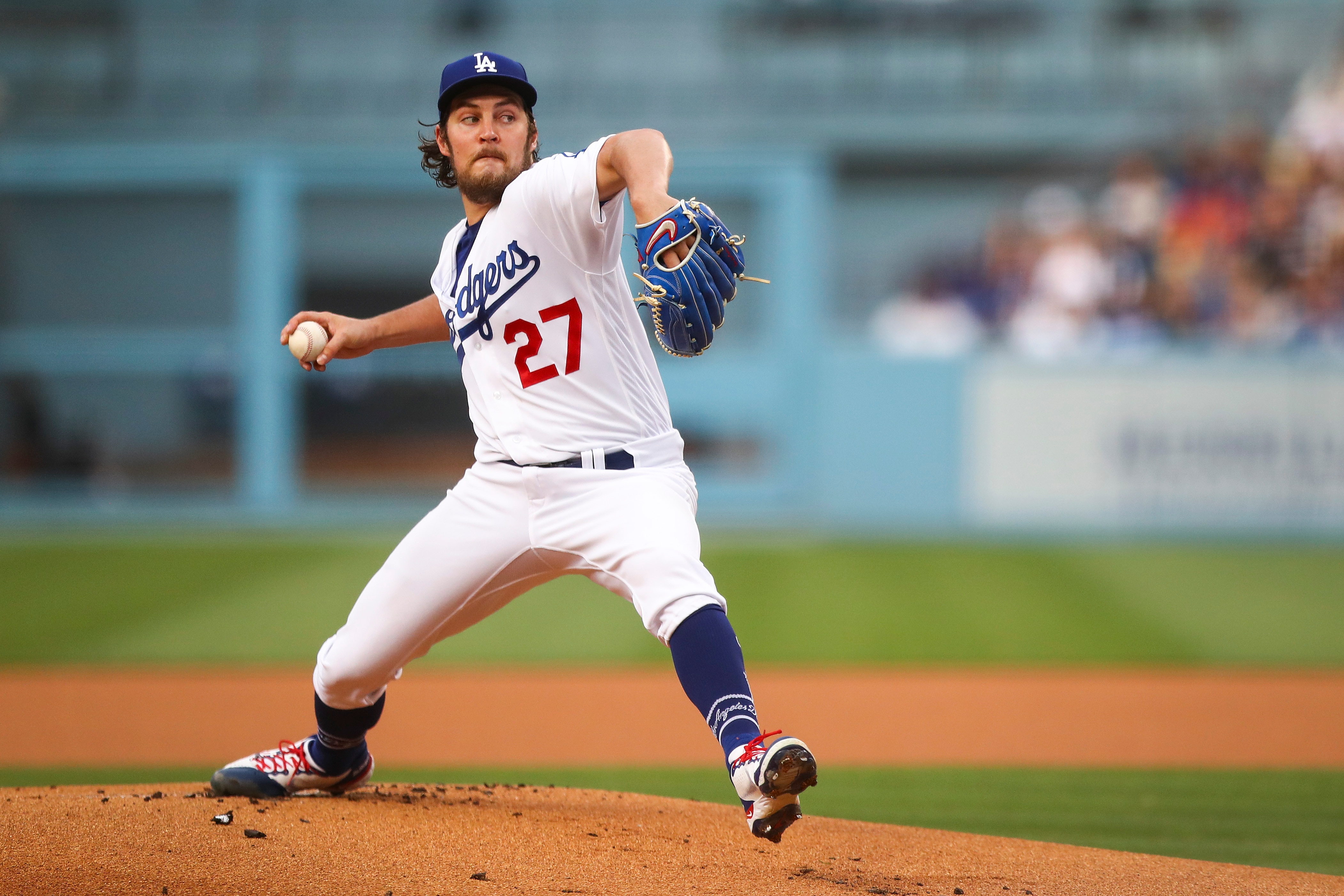 LOS ANGELES, CALIFORNIA - JUNE 28: Trevor Bauer #27 of the Los Angeles Dodgers throws the first pitch of the game against the San Francisco Giants at Dodger Stadium on June 28, 2021 in Los Angeles, California. (Photo by Meg Oliphant/Getty Images)