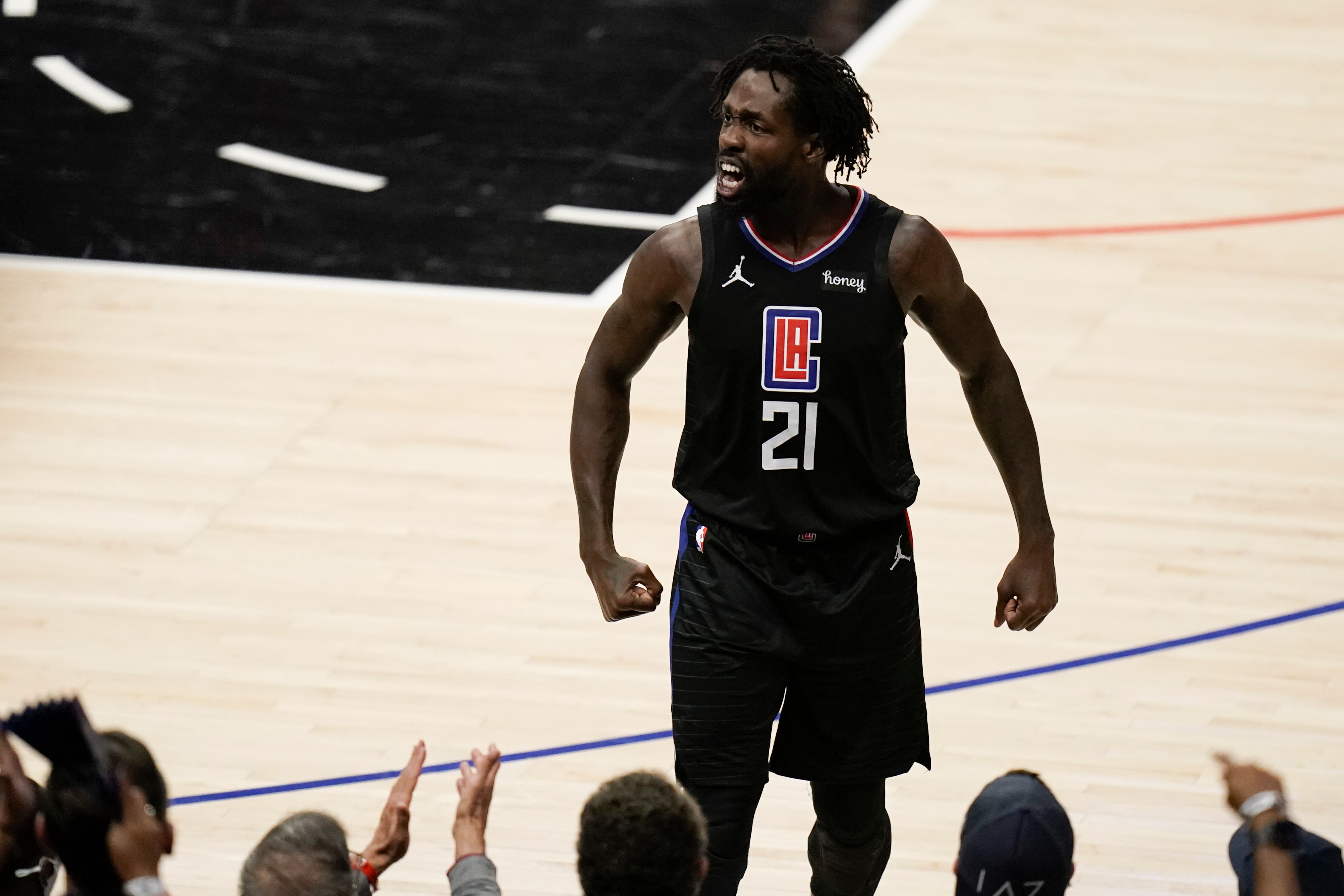 Los Angeles Clippers' Patrick Beverley reacts to a play during the first half in Game 6 of the the team's NBA basketball Western Conference final against the Phoenix Suns on Wednesday, June 30, 2021, in Los Angeles. (AP Photo/Jae C. Hong)