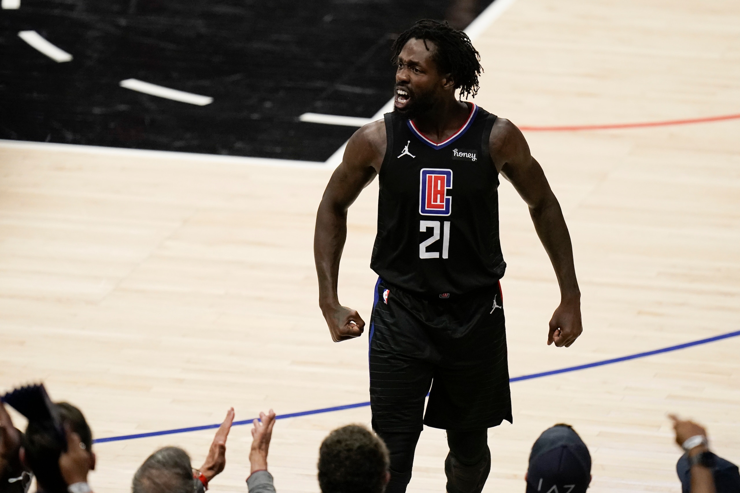Los Angeles Clippers' Patrick Beverley reacts to a play during the first half in Game 6 of the the team's NBA basketball Western Conference final against the Phoenix Suns on Wednesday, June 30, 2021, in Los Angeles. (AP Photo/Jae C. Hong)