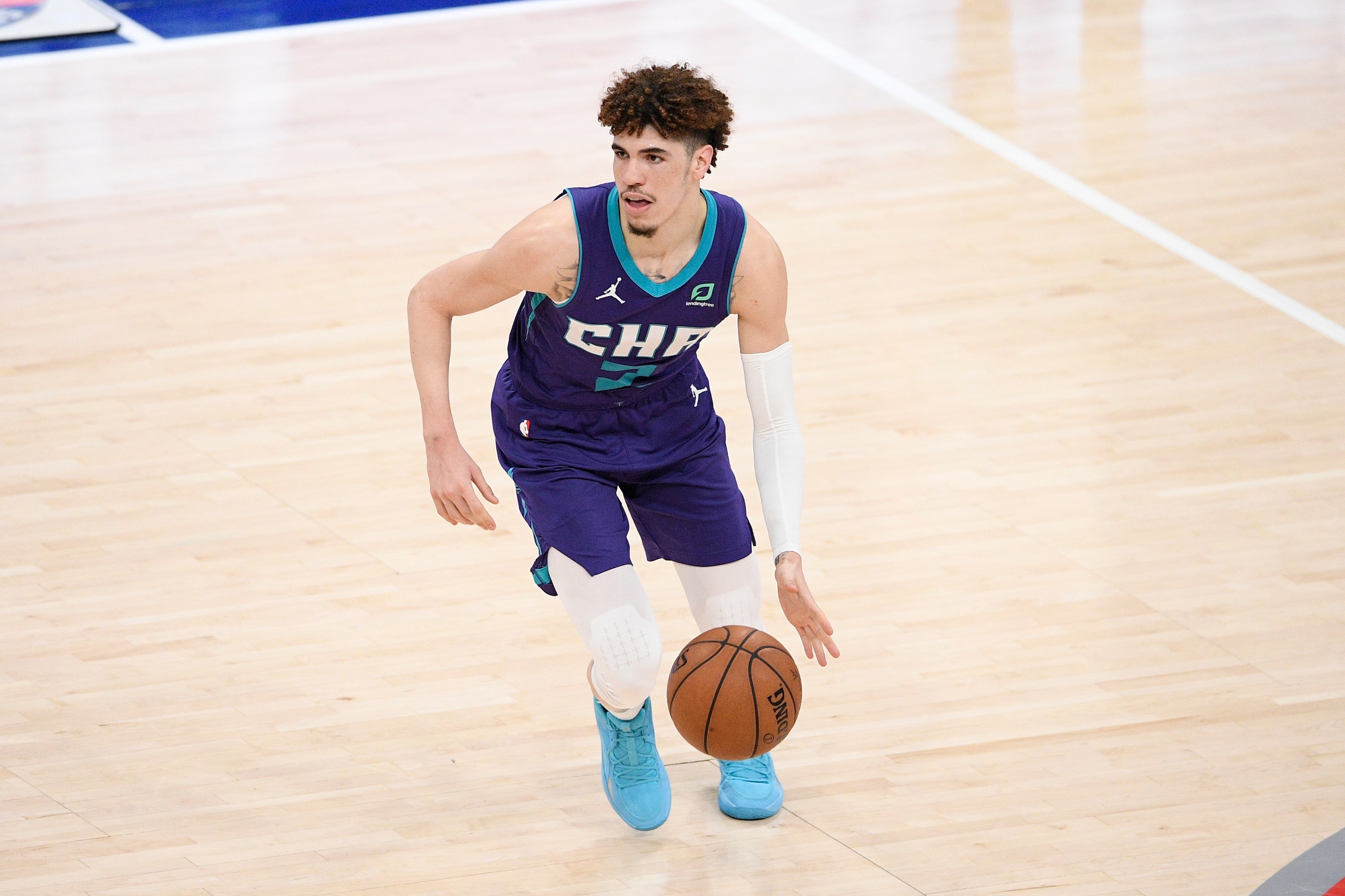 Charlotte Hornets guard LaMelo Ball (2) dribbles the ball during the second half of an NBA basketball game against the Washington Wizards, Sunday, May 16, 2021, in Washington. (AP Photo/Nick Wass)