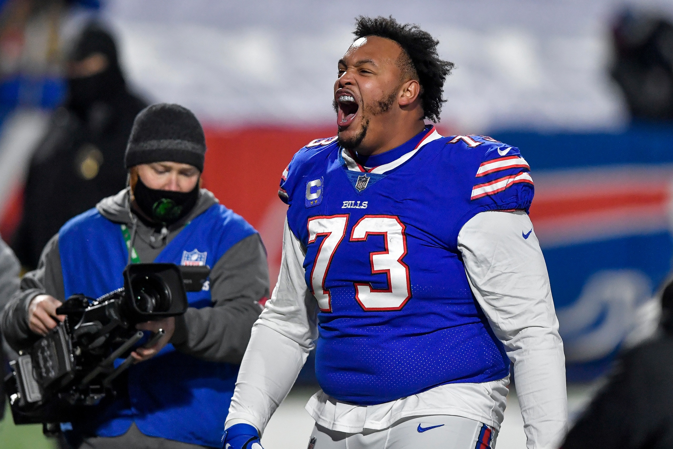 Buffalo Bills tackle Dion Dawkins (73) celebrates after an NFL divisional round football game against the Baltimore Ravens Saturday, Jan. 16, 2021, in Orchard Park, N.Y. The Bills won 17-3. (AP Photo/Adrian Kraus)