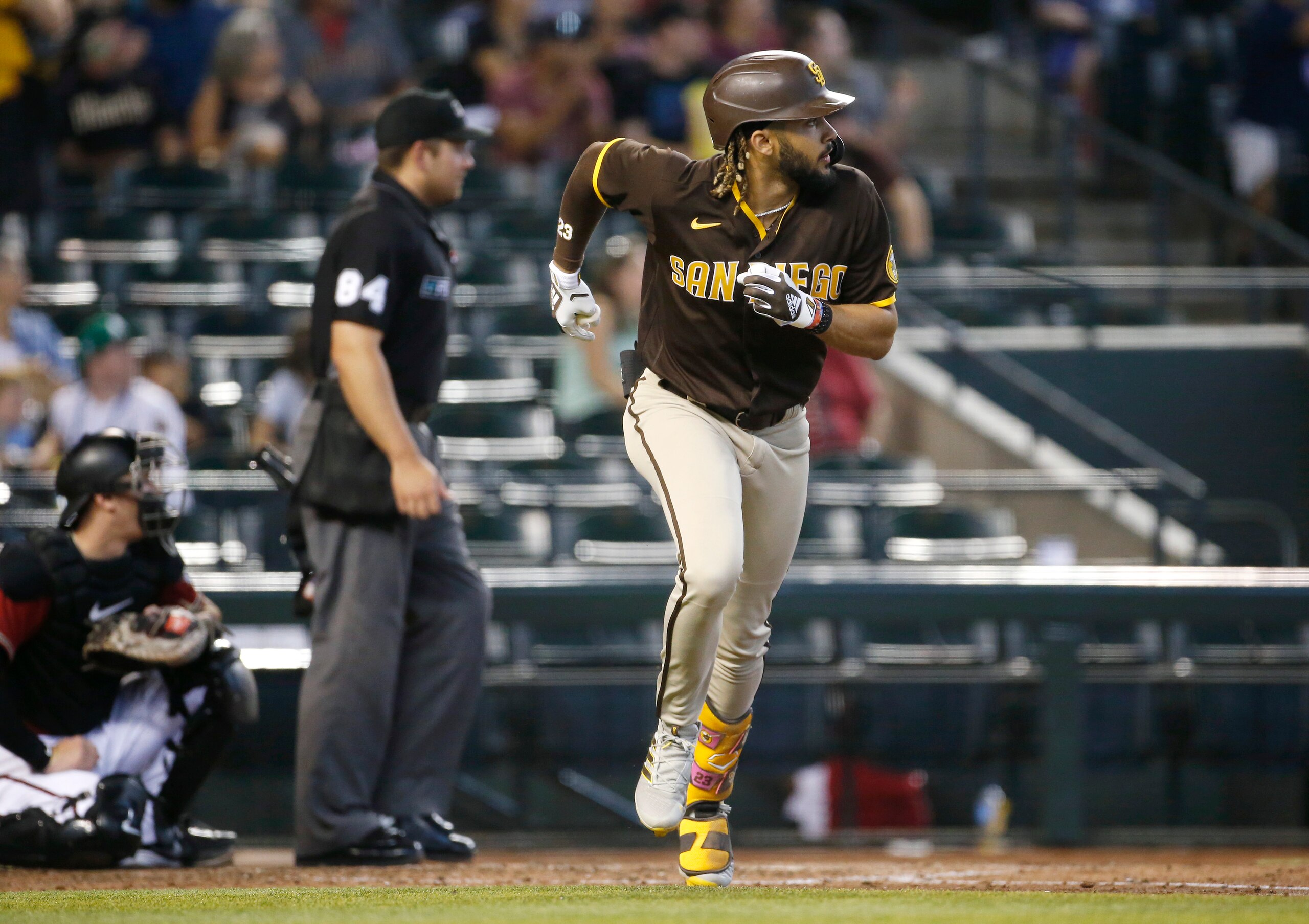 PHOENIX, ARIZONA - AUGUST 15: Fernando Tatis Jr #23 of the San Diego Padres runs to first base after hitting a solo home run against the Arizona Diamondbacks during the fifth inning of the MLB game at Chase Field on August 15, 2021 in Phoenix, Arizona. It was Tatis' second homer of the game. (Photo by Ralph Freso/Getty Images)