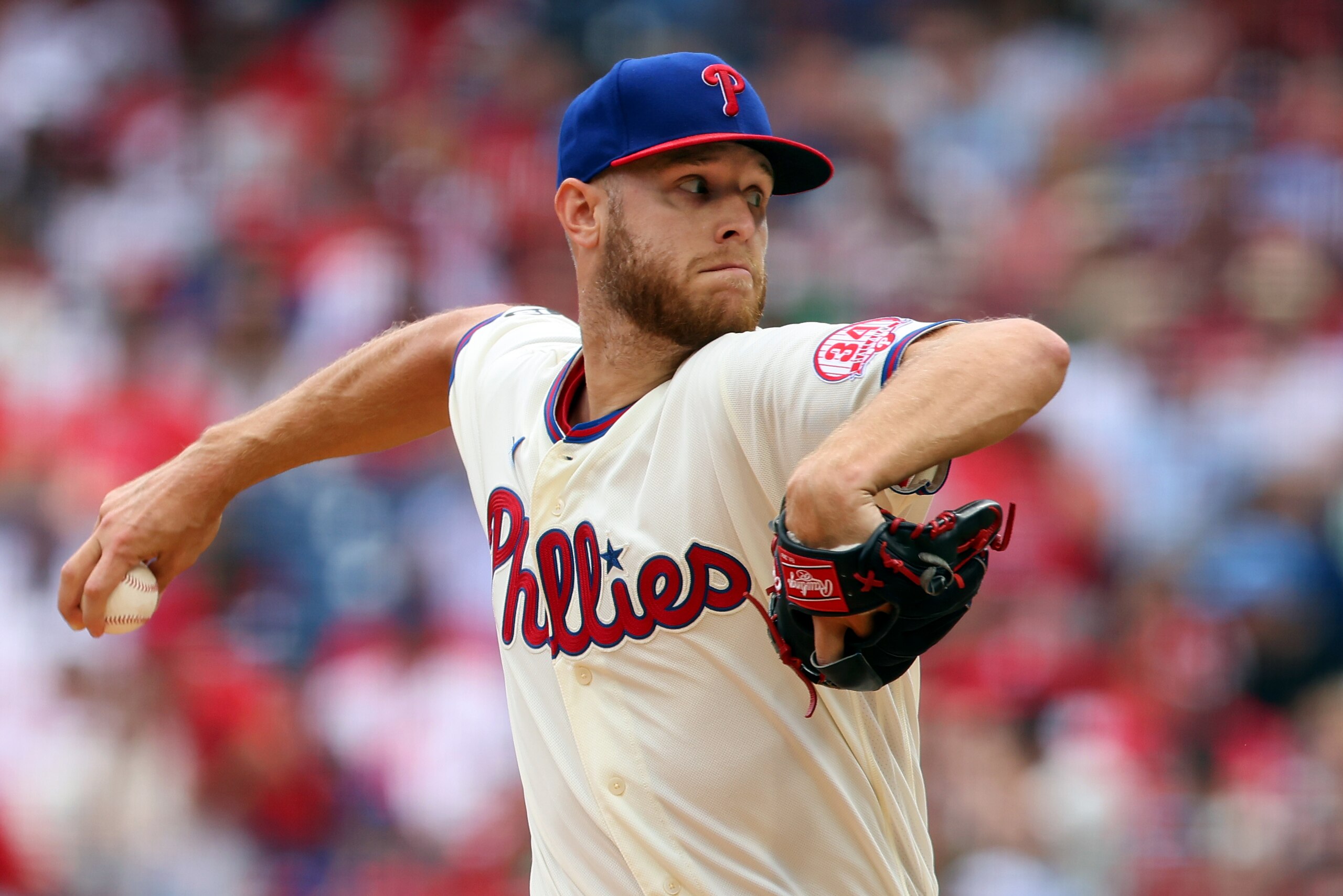 PHILADELPHIA, PA - AUGUST 08: Pitcher Zack Wheeler #45 of the Philadelphia Phillies delivers a pitch against the New York Mets during the first inning of a game at Citizens Bank Park on August 8, 2021 in Philadelphia, Pennsylvania. (Photo by Rich Schultz/Getty Images)