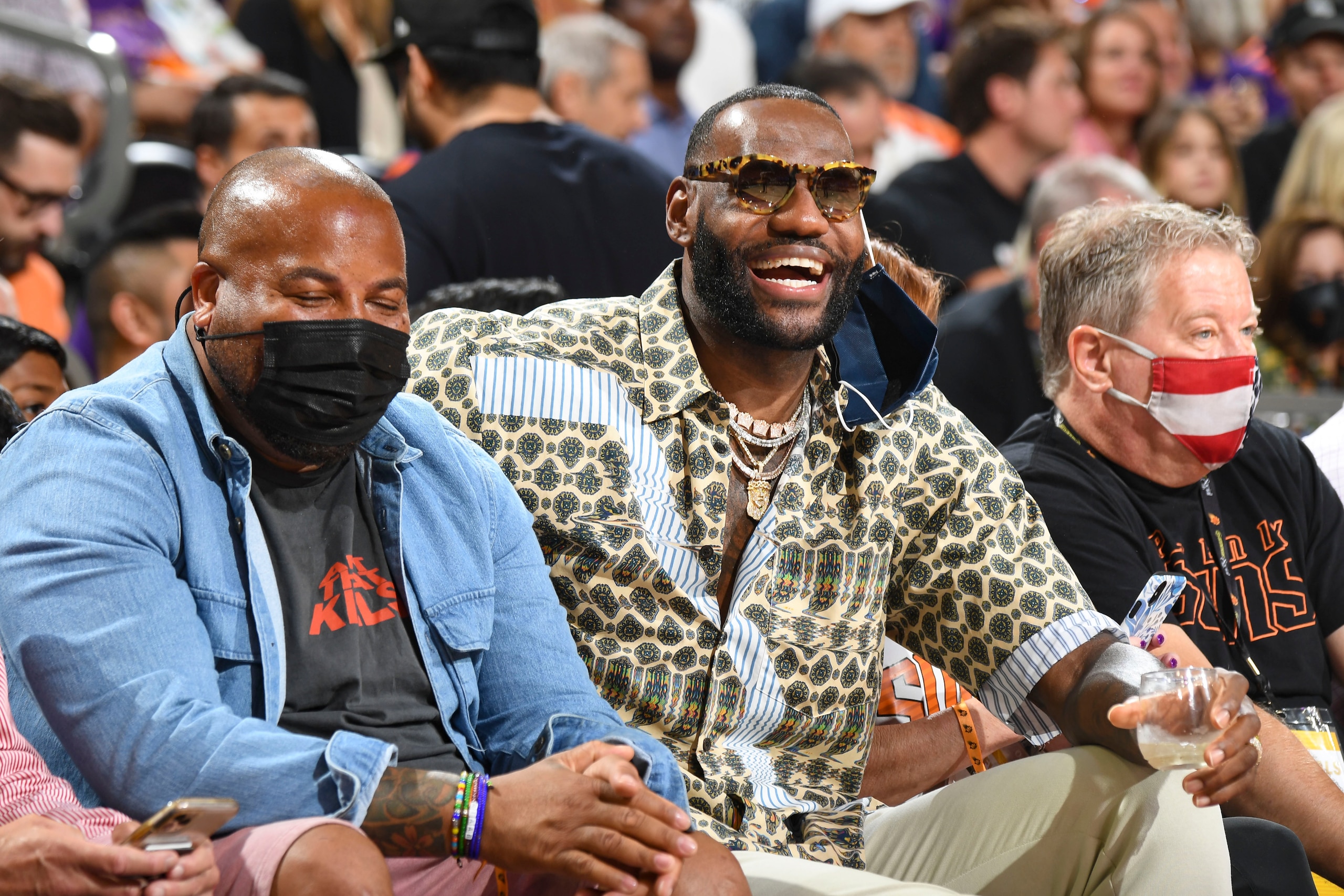 PHOENIX, AZ - JULY 17: LeBron James #23 of the Los Angeles Lakers attends a game between the Phoenix Suns and Milwaukee Bucks during Game Five of the 2021 NBA Finals on July 17, 2021 at Footprint Center in Phoenix, Arizona. NOTE TO USER: User expressly acknowledges and agrees that, by downloading and or using this photograph, user is consenting to the terms and conditions of the Getty Images License Agreement. Mandatory Copyright Notice: Copyright 2021 NBAE (Photo by Andrew D. Bernstein/NBAE via Getty Images)