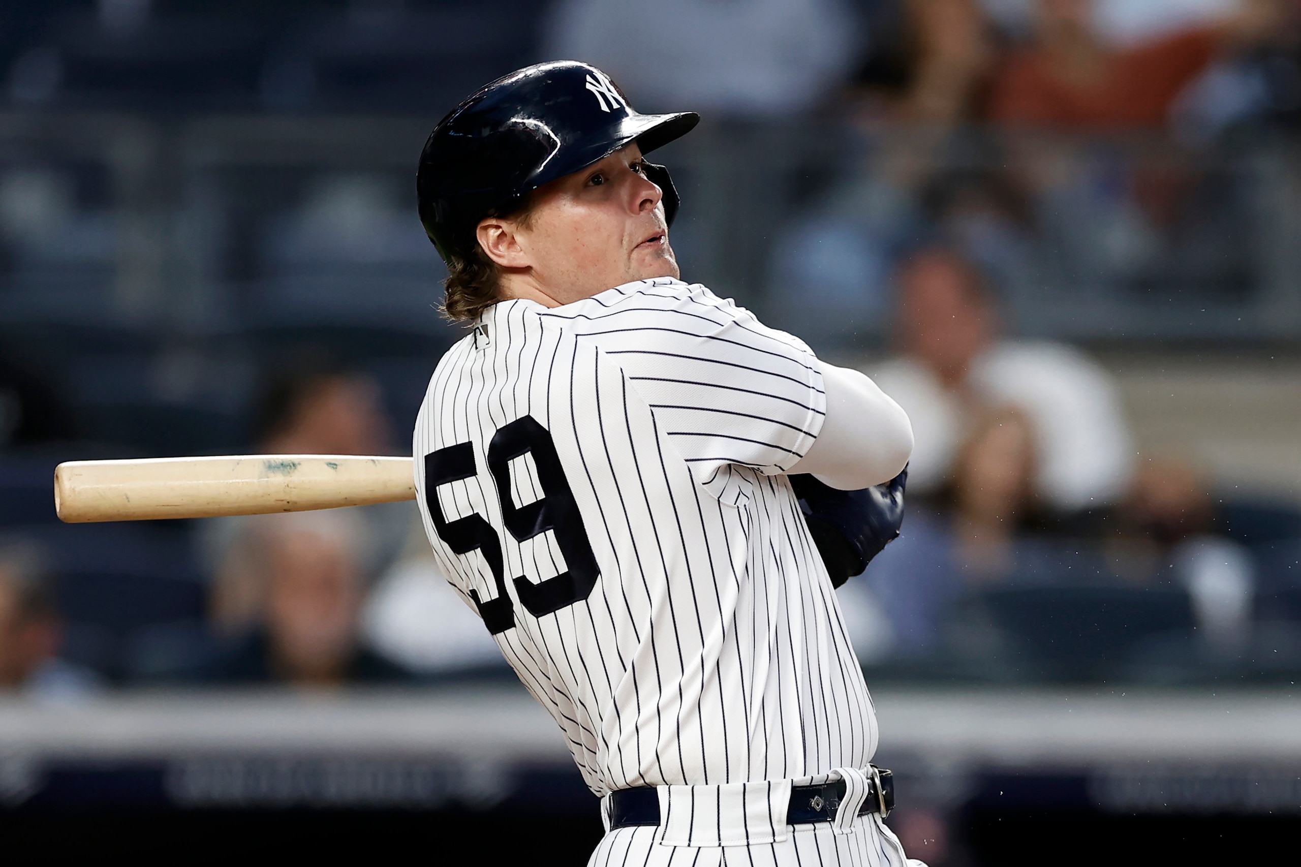 NEW YORK, NY - AUGUST 17: Luke Voit #59 of the New York Yankees hits a home run against the Boston Red Sox in the second inning during game two of a doubleheader at Yankee Stadium on August 17, 2021 in New York City. (Photo by Adam Hunger/Getty Images)