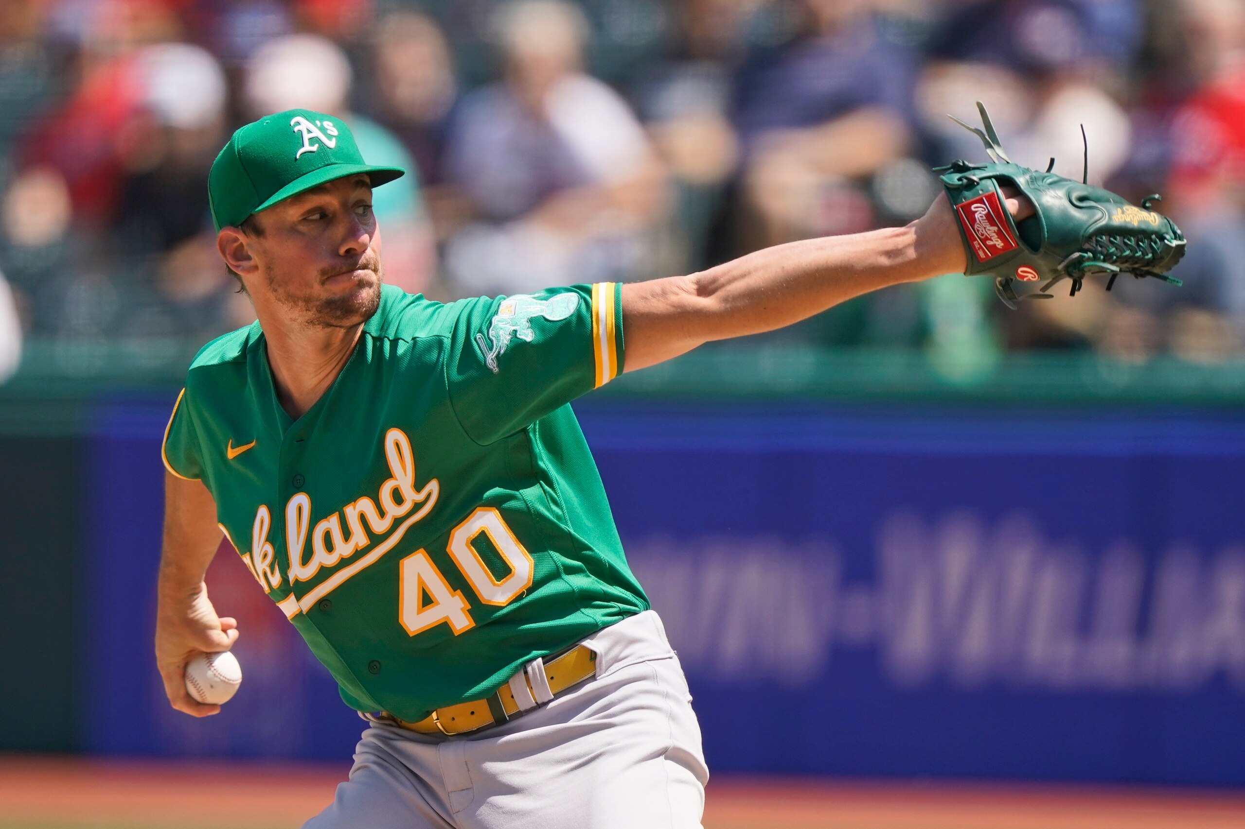 Oakland Athletics starting pitcher Chris Bassitt delivers in the first inning of a baseball game against the Oakland Athletics, Thursday, Aug. 12, 2021, in Cleveland. (AP Photo/Tony Dejak) Oakland Athletics starting pitcher Chris Bassitt delivers in the first inning of a baseball game against the Oakland Athletics, Thursday, Aug. 12, 2021, in Cleveland. (AP Photo/Tony Dejak)