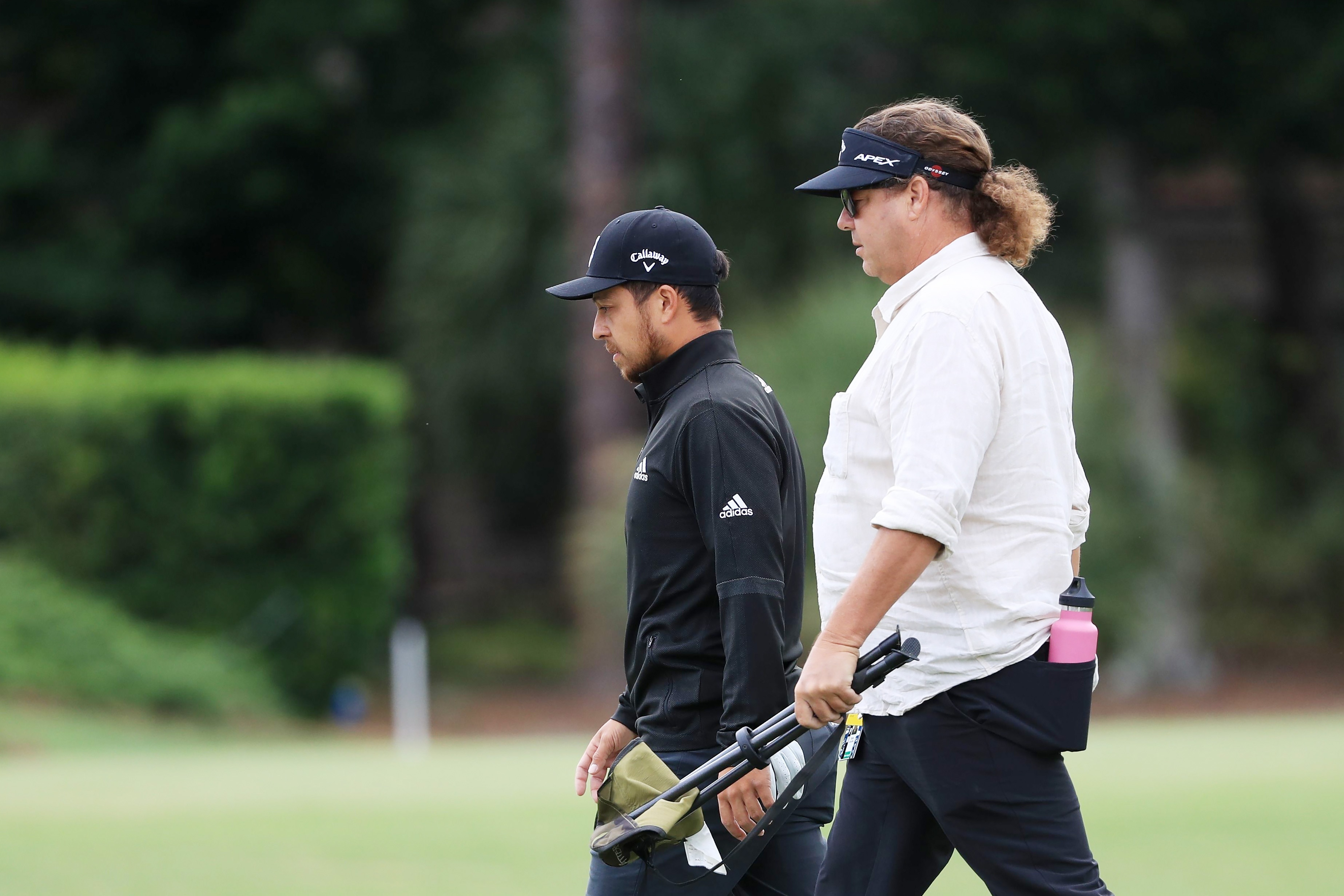 HILTON HEAD ISLAND, SOUTH CAROLINA - JUNE 17: Xander Schauffele of the United States walks with his father and coach Stefan Schauffele during a practice round prior to the RBC Heritage on June 17, 2020 at Harbour Town Golf Links in Hilton Head Island, South Carolina. (Photo by Streeter Lecka/Getty Images)
