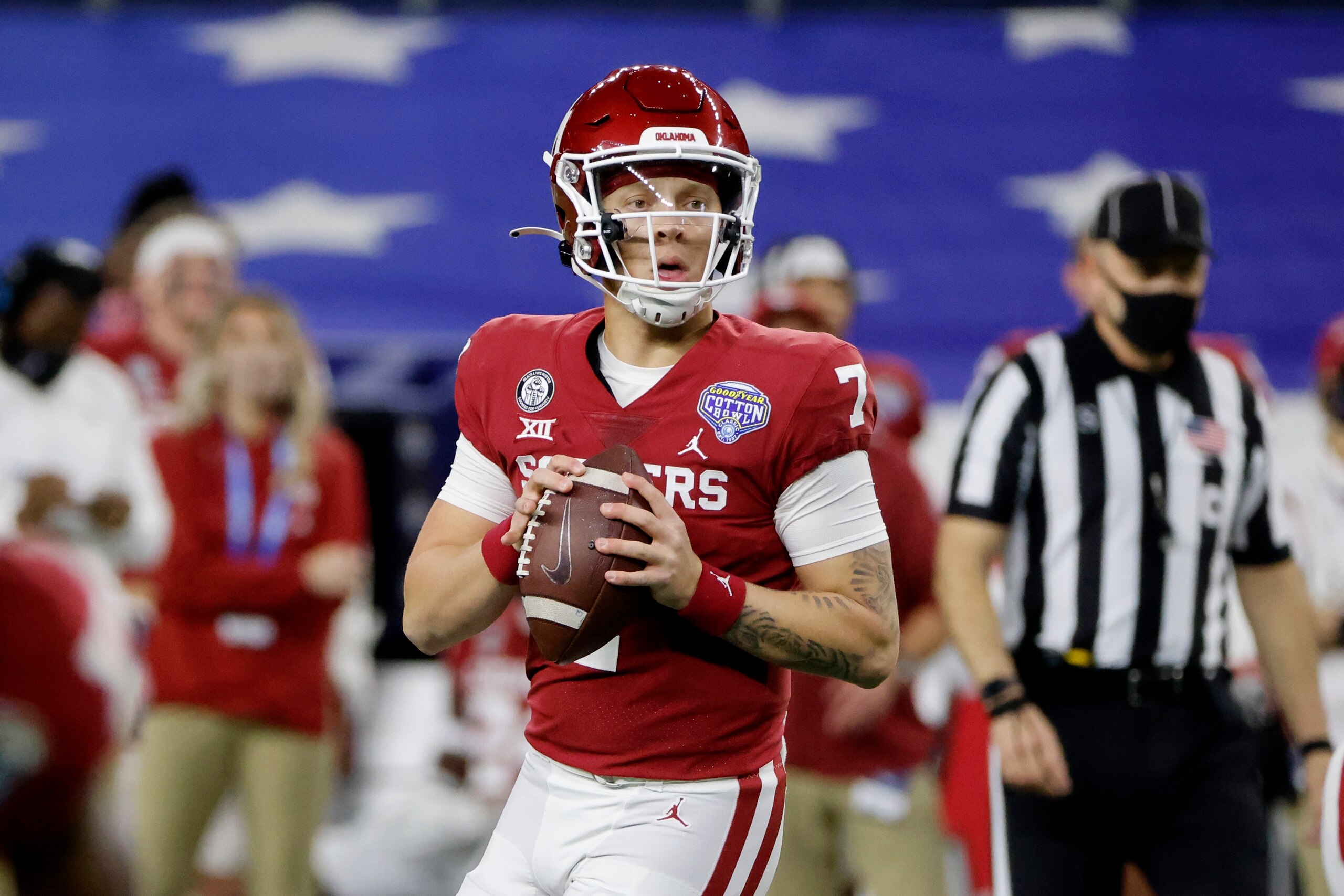 Oklahoma quarterback Spencer Rattler drops back to pass during the first half of the team's Cotton Bowl NCAA college football game against Florida in Arlington, Texas, Wednesday, Dec. 30, 2020. (AP Photo/Michael Ainsworth)