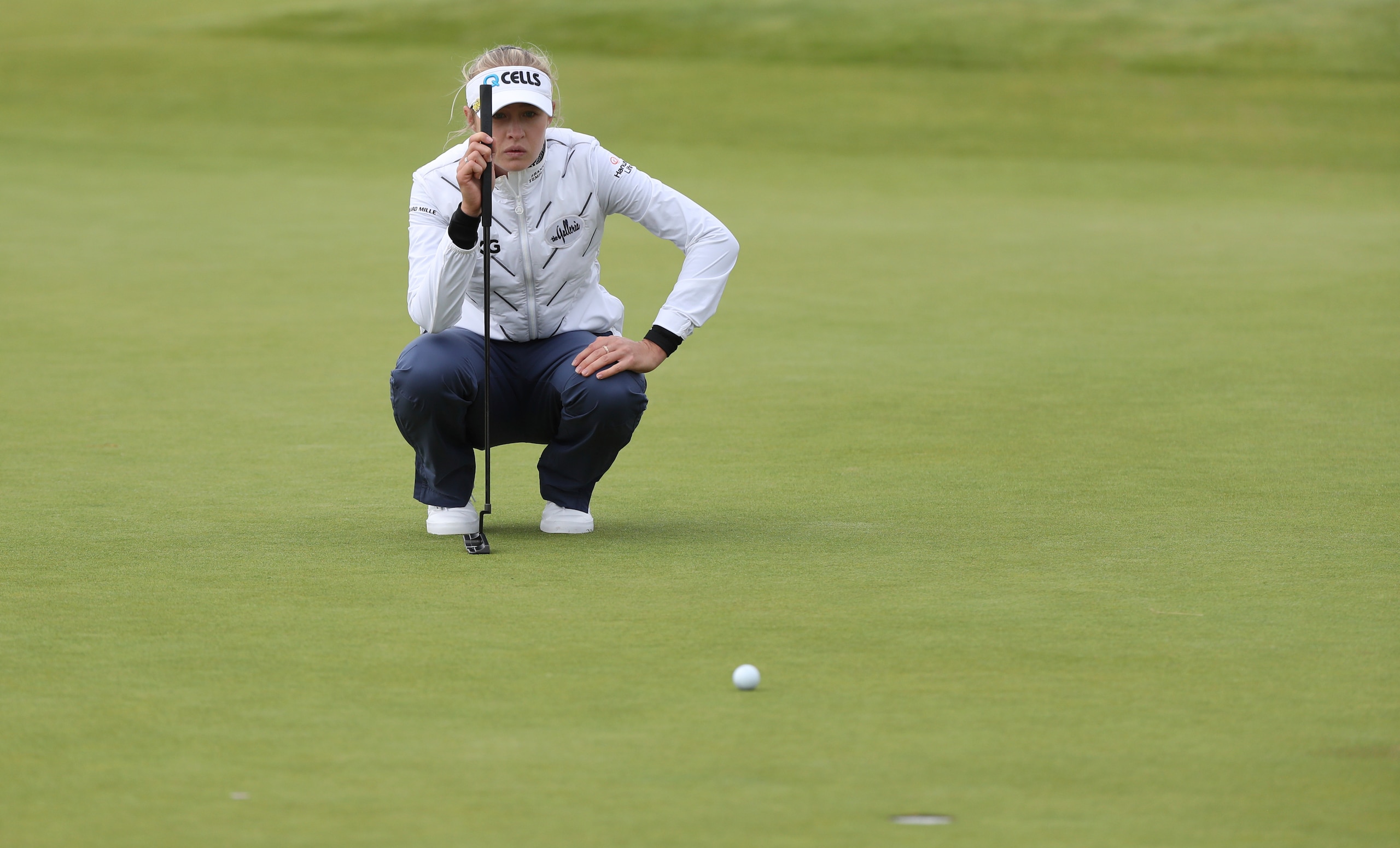 United States' Nelly Korda looks at her putt on the 18th green during the first round of the Women's British Open golf championship, in Carnoustie, Scotland, Thursday, Aug. 19, 2021. (AP Photo/Scott Heppell)