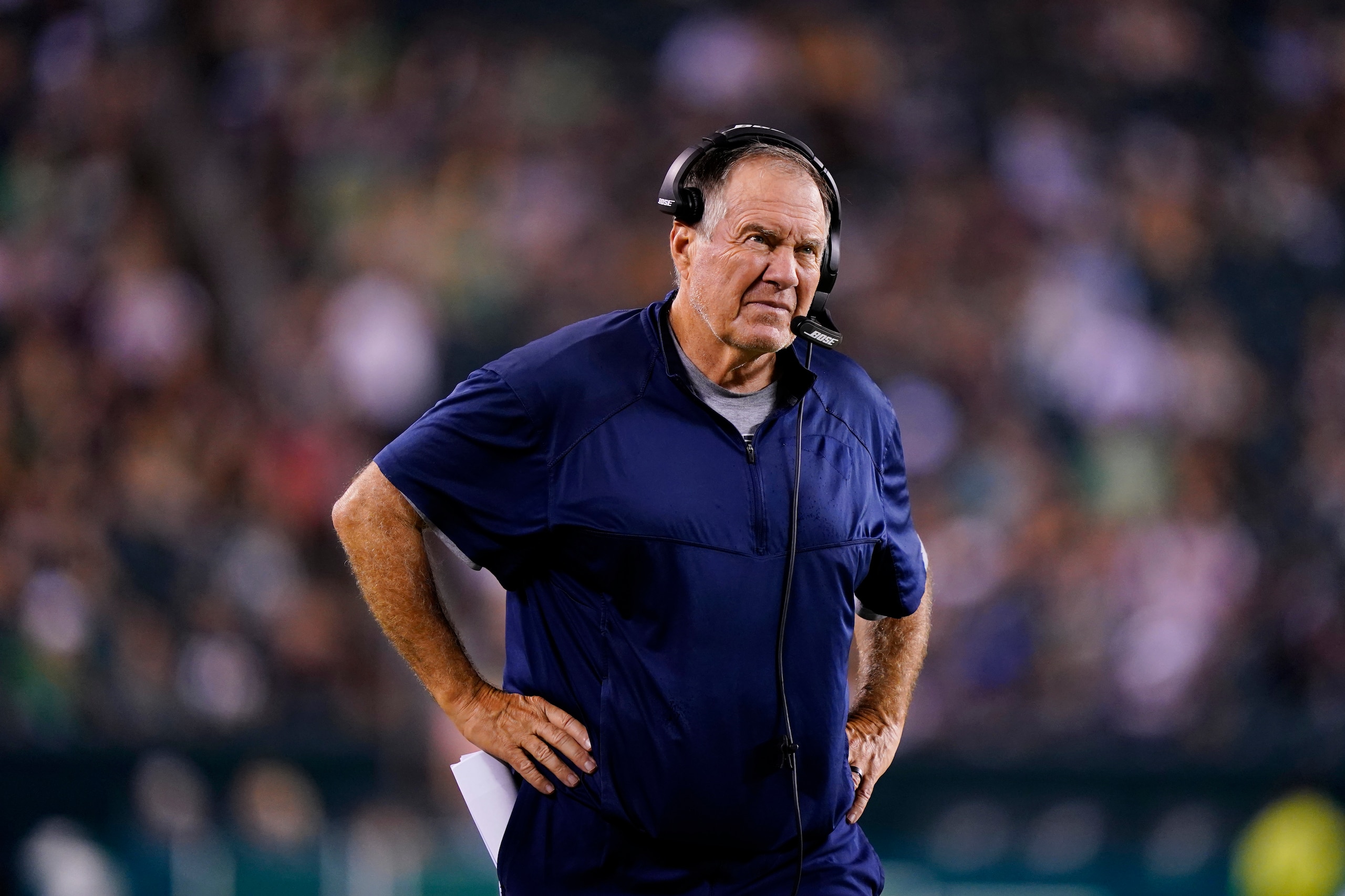 New England Patriots' Bill Belichick watches the second half of a preseason NFL football game against the Philadelphia Eagles on Thursday, Aug. 19, 2021, in Philadelphia. (AP Photo/Matt Rourke)