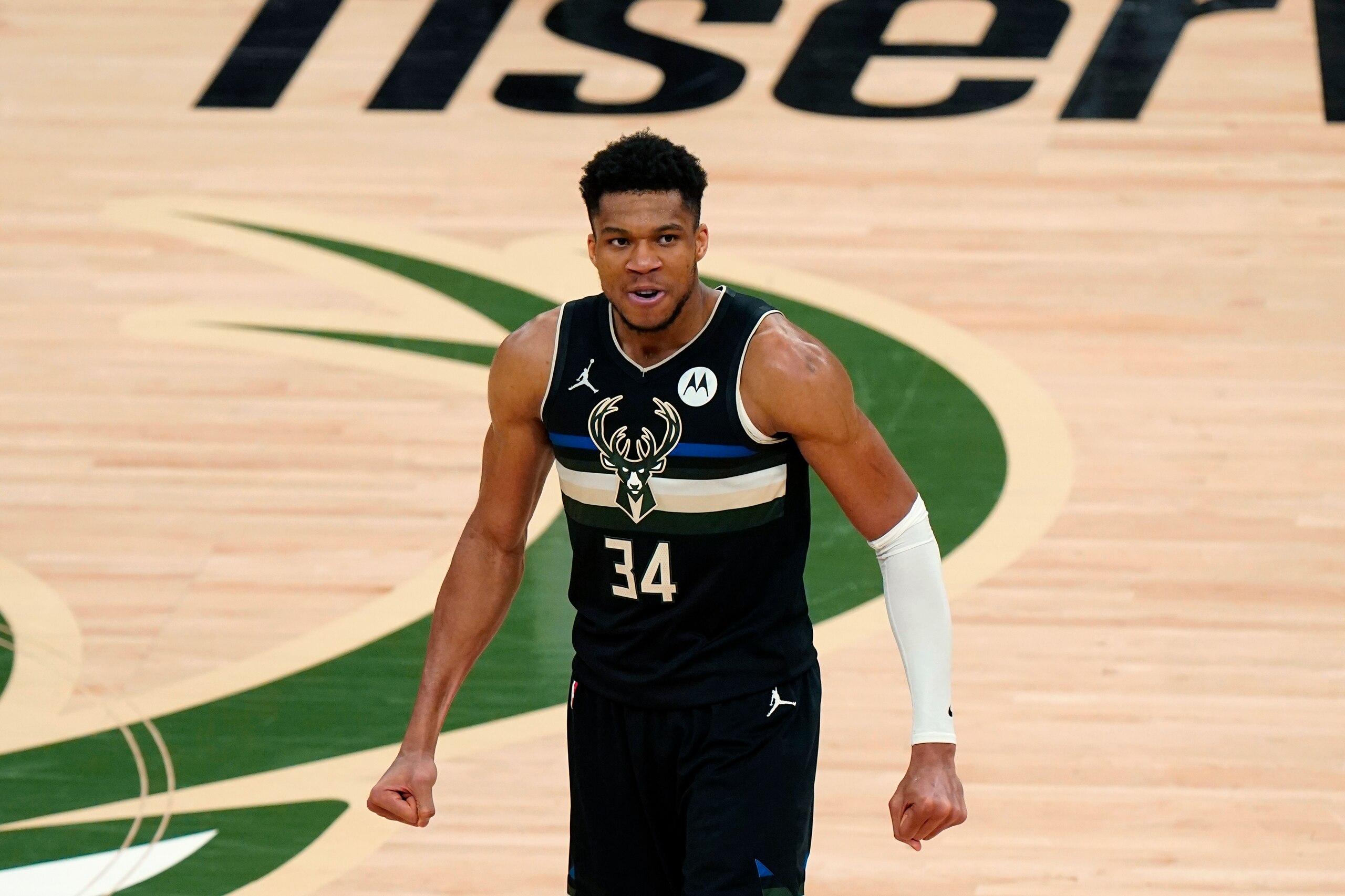 Milwaukee Bucks forward Giannis Antetokounmpo (34) reacts during the second half of Game 6 of basketball's NBA Finals against the Phoenix Suns in Milwaukee, Tuesday, July 20, 2021. (AP Photo/Paul Sancya)