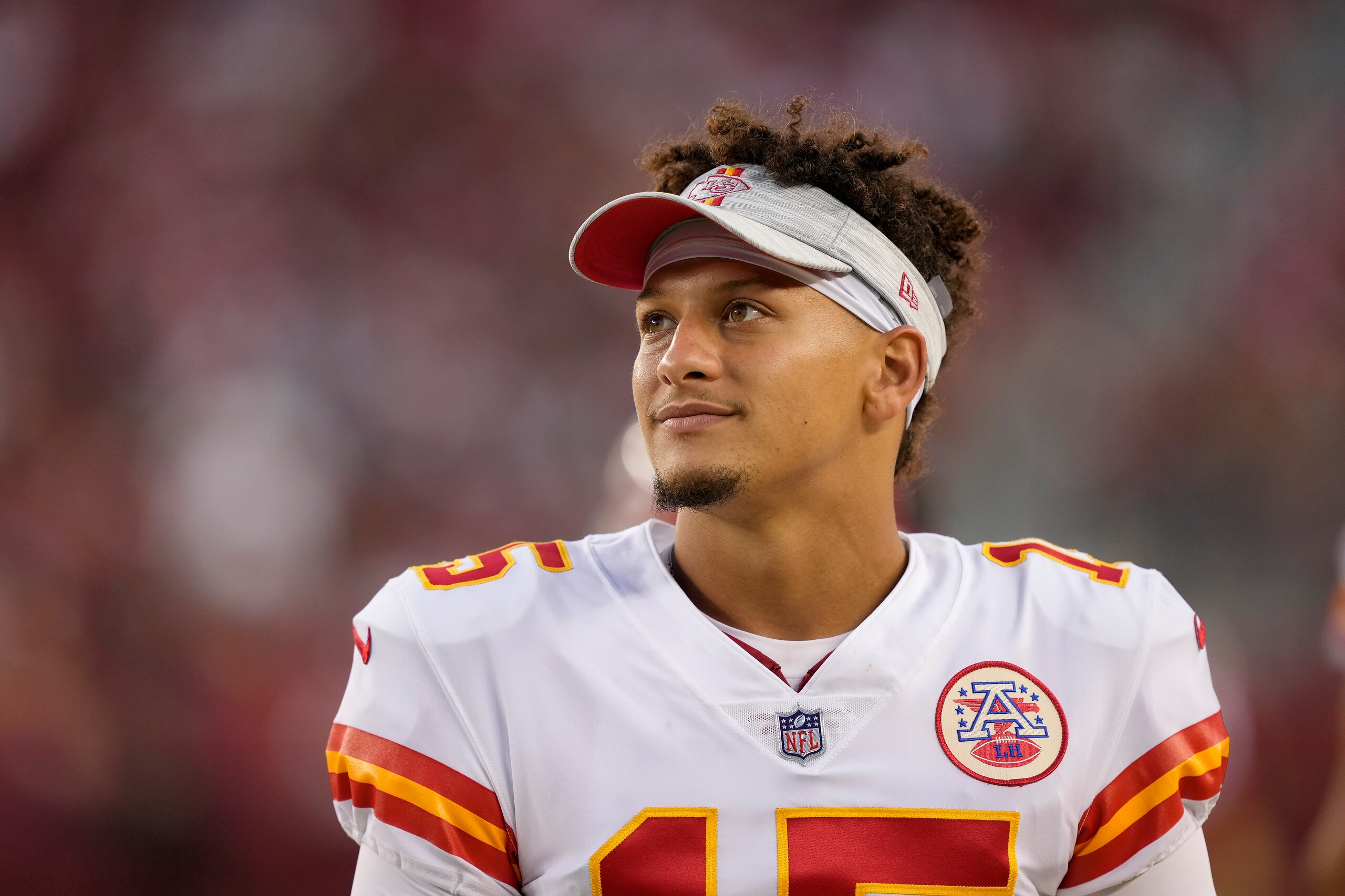 Kansas City Chiefs quarterback Patrick Mahomes stands on the sideline during the second half of an NFL preseason football game against the San Francisco 49ers in Santa Clara, Calif., Saturday, Aug. 14, 2021. (AP Photo/Tony Avelar)