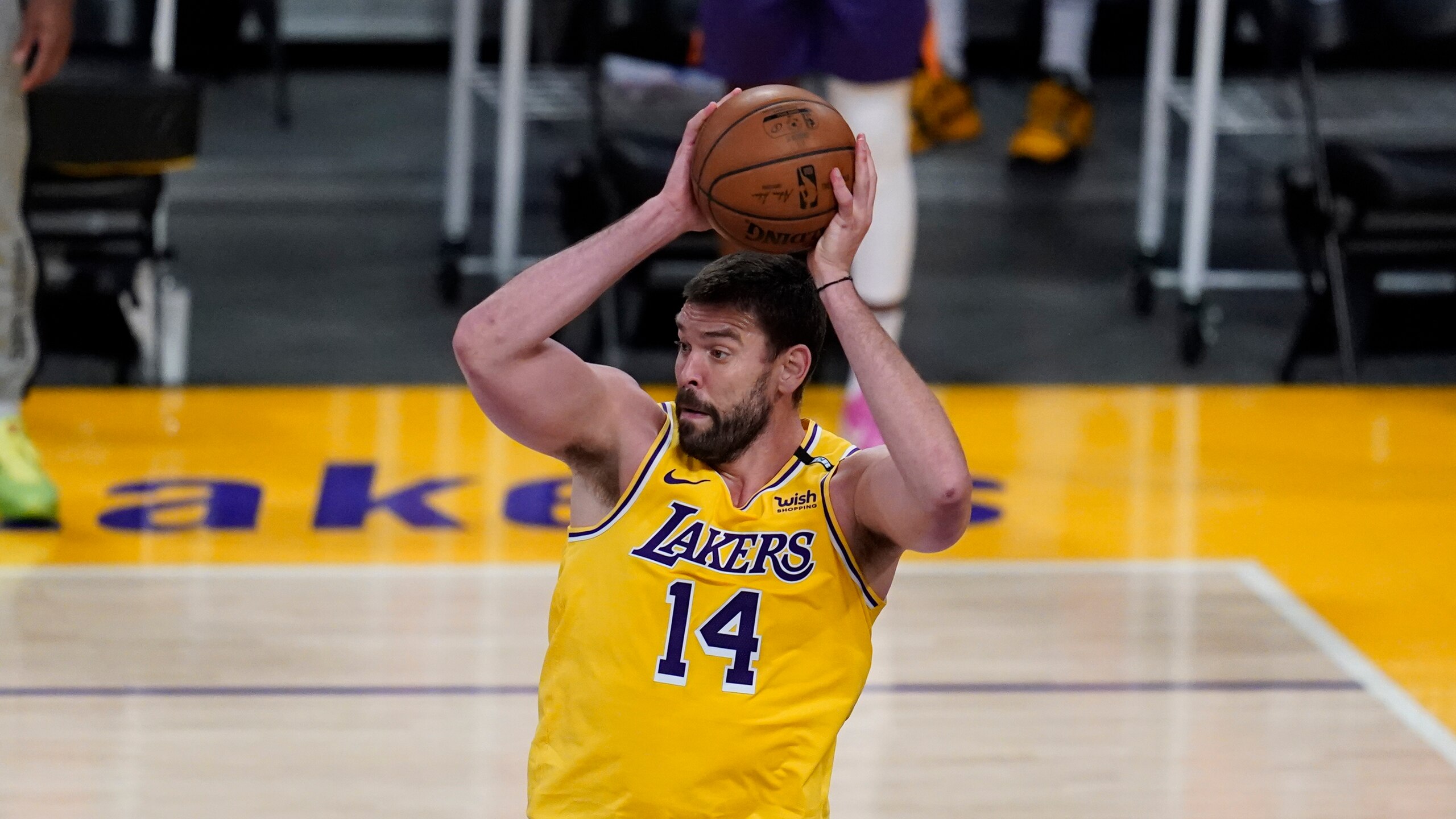 Los Angeles Lakers center Marc Gasol (14) passes the ball during Game 6 of an NBA basketball first-round playoff series against the Phoenix Suns Thursday, Jun 3, 2021, in Los Angeles. (AP Photo/Ashley Landis)