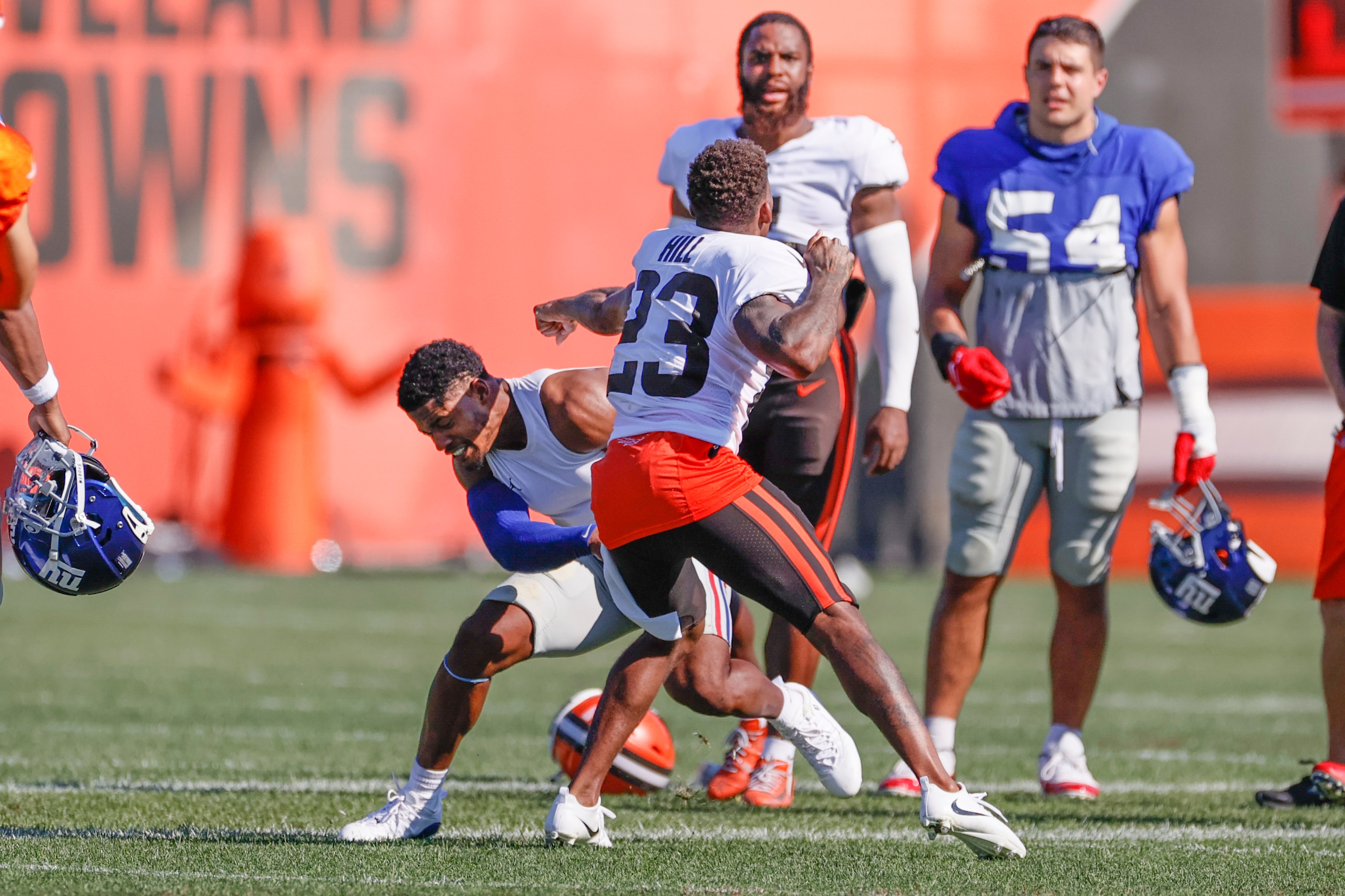 Cleveland Browns cornerback Troy Hill (23) and New York Giants wide receiver Sterling Shepard (3) get into a fight during a joint NFL football training camp practice Friday, Aug. 20, 2021, in Berea, Ohio. (AP Photo/Ron Schwane)
