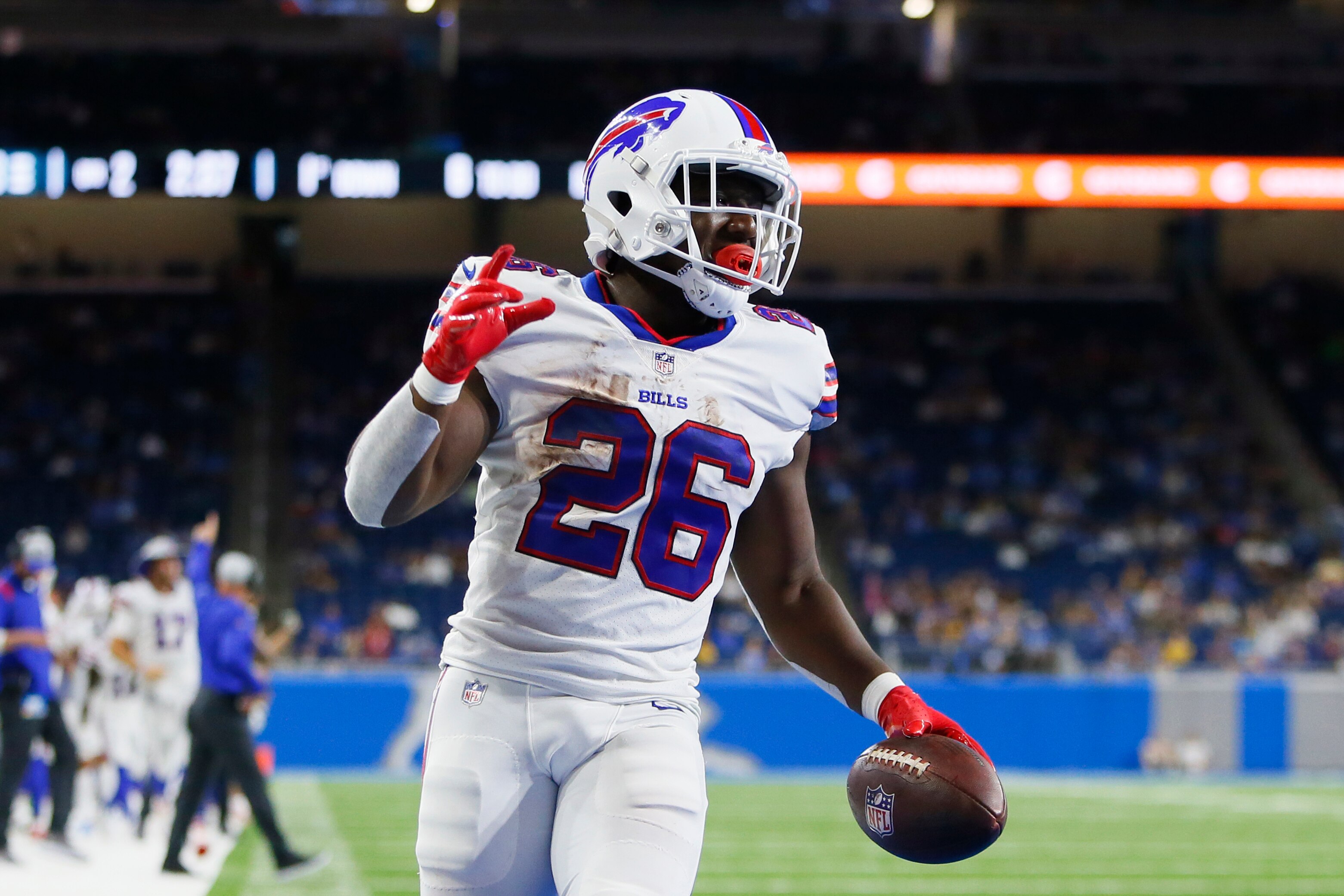 Buffalo Bills running back Devin Singletary runs for a 6-yard touchdown during the first half of a preseason NFL football game against the Detroit Lions, Friday, Aug. 13, 2021, in Detroit. (AP Photo/Duane Burleson)