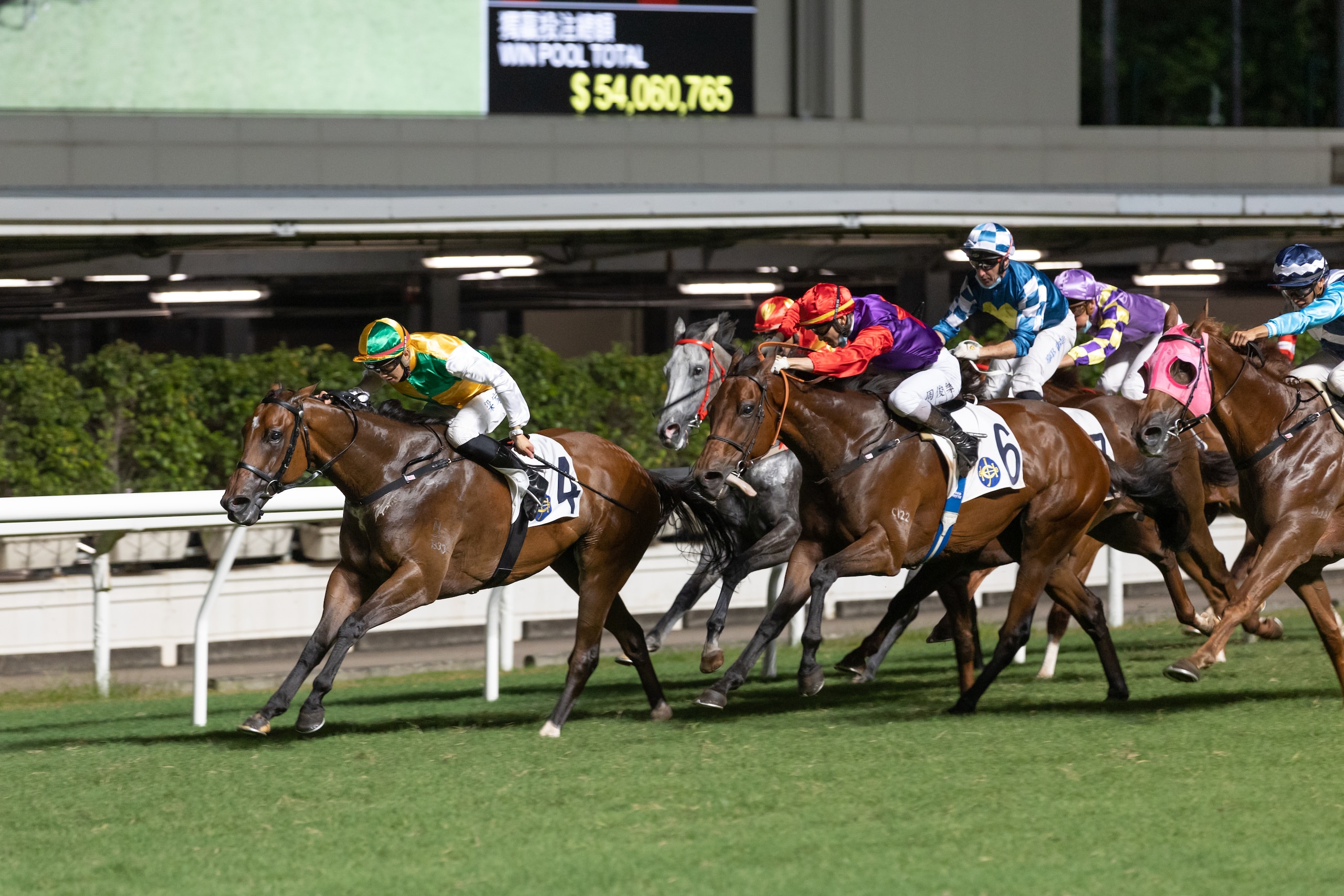 HONG KONG, CHINA - JULY 14 : Jockey Derek Leung Ka-chun riding Sparkling Dragon wins the Race 9 Sports Road Handicap (Class 2) at Happy Valley Racecourse on July 14, 2021 in Hong Kong. (Photo by Lo Chun Kit /Getty Images)