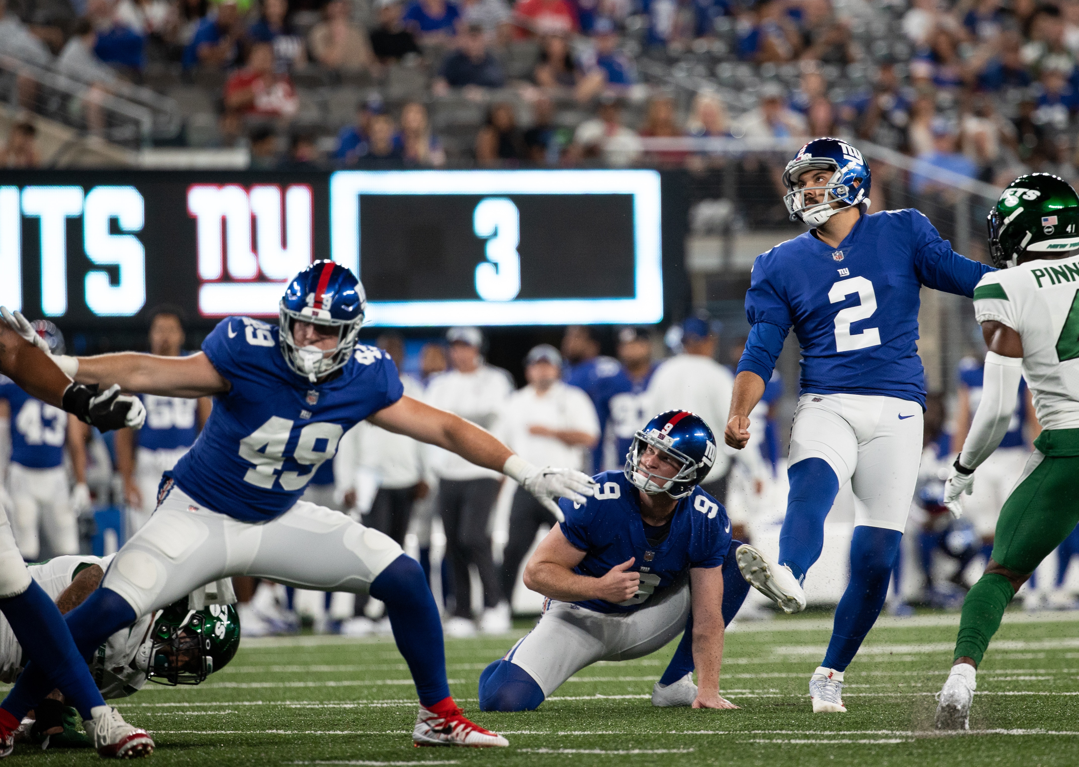EAST RUTHERFORD, NJ - AUGUST 14: Ryan Santoso #2 of the New York Giants kicks an extra point during the fourth quarter of a preseason game against the New York Jets at MetLife Stadium on August 14, 2021 in East Rutherford, New Jersey. (Photo by Dustin Satloff/Getty Images)