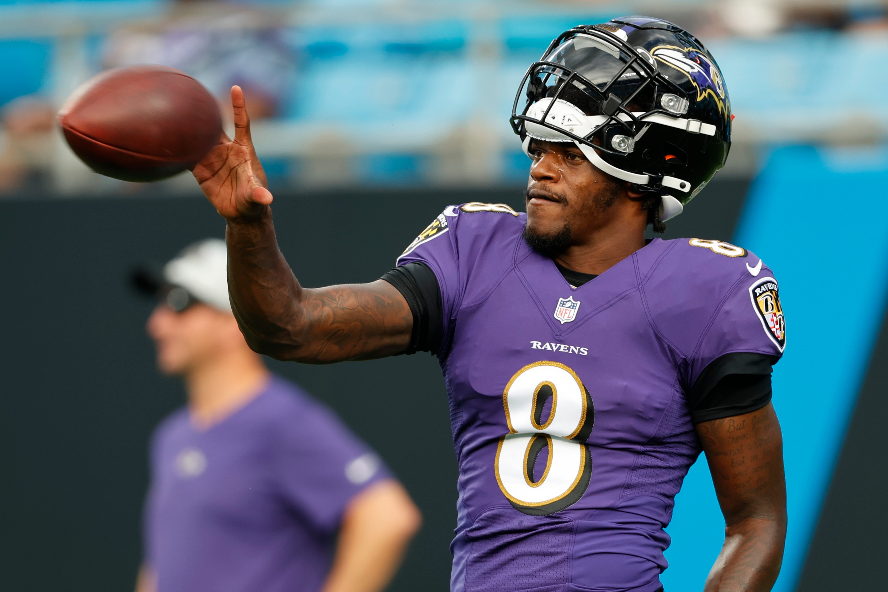 Baltimore Ravens quarterback Lamar Jackson warms up before a preseason NFL football game against the Carolina Panthers Saturday, Aug. 21, 2021, in Charlotte, N.C. (AP Photo/Nell Redmond)
