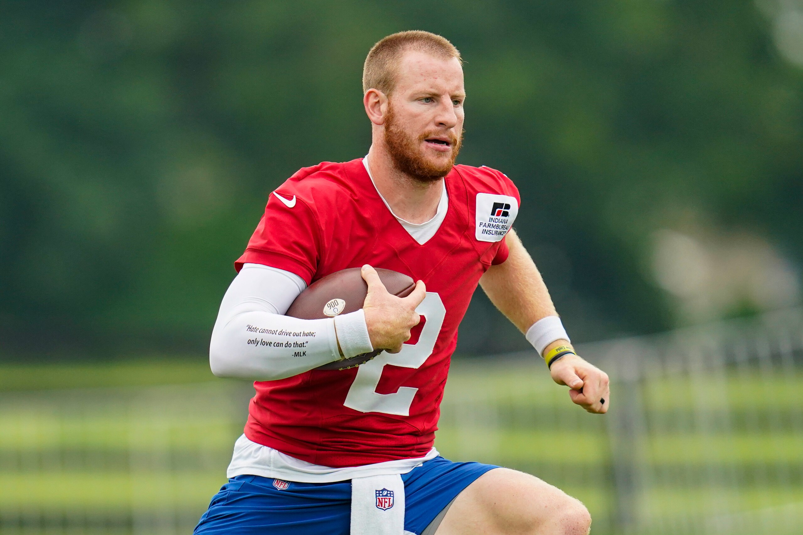 Indianapolis Colts quarterback Carson Wentz runs a drill during practice at the NFL team's football training camp in Westfield, Ind., Wednesday, July 28, 2021. (AP Photo/Michael Conroy) Indianapolis Colts quarterback Carson Wentz runs a drill during practice at the NFL team's football training camp in Westfield, Ind., Wednesday, July 28, 2021. (AP Photo/Michael Conroy)
