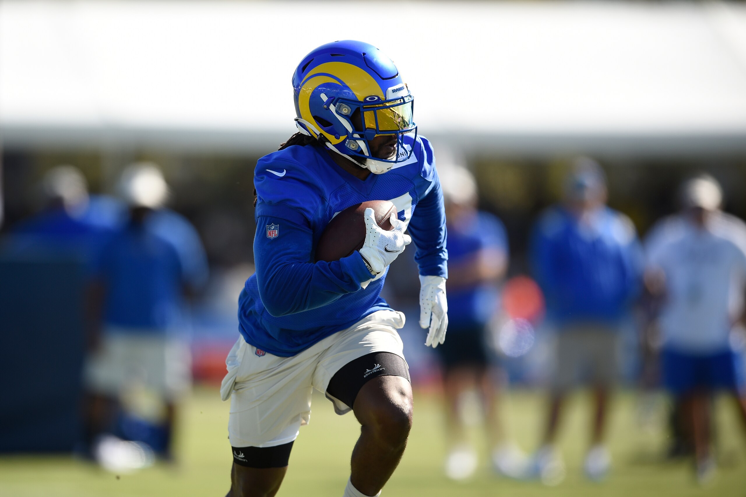 Los Angeles Rams running back Darrell Henderson Jr. runs drills during an NFL football training camp practice in Irvine, Calif., Saturday, July 31, 2021. (AP Photo/Kelvin Kuo)