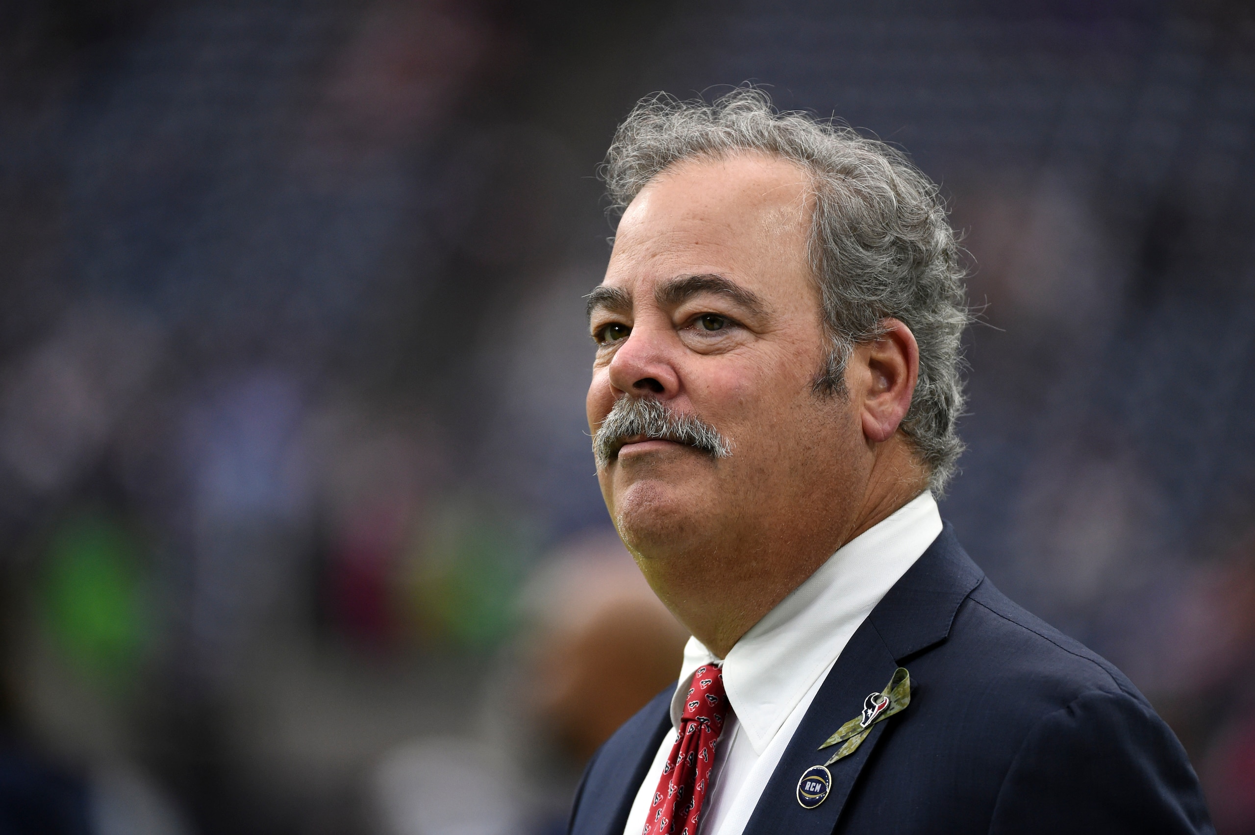 Houston Texans Chairman and Chief Executive Officer Cal McNair watches warm ups before an NFL wild-card playoff football game against the Buffalo Bills Saturday, Jan. 4, 2020, in Houston. (AP Photo/Eric Christian Smith)